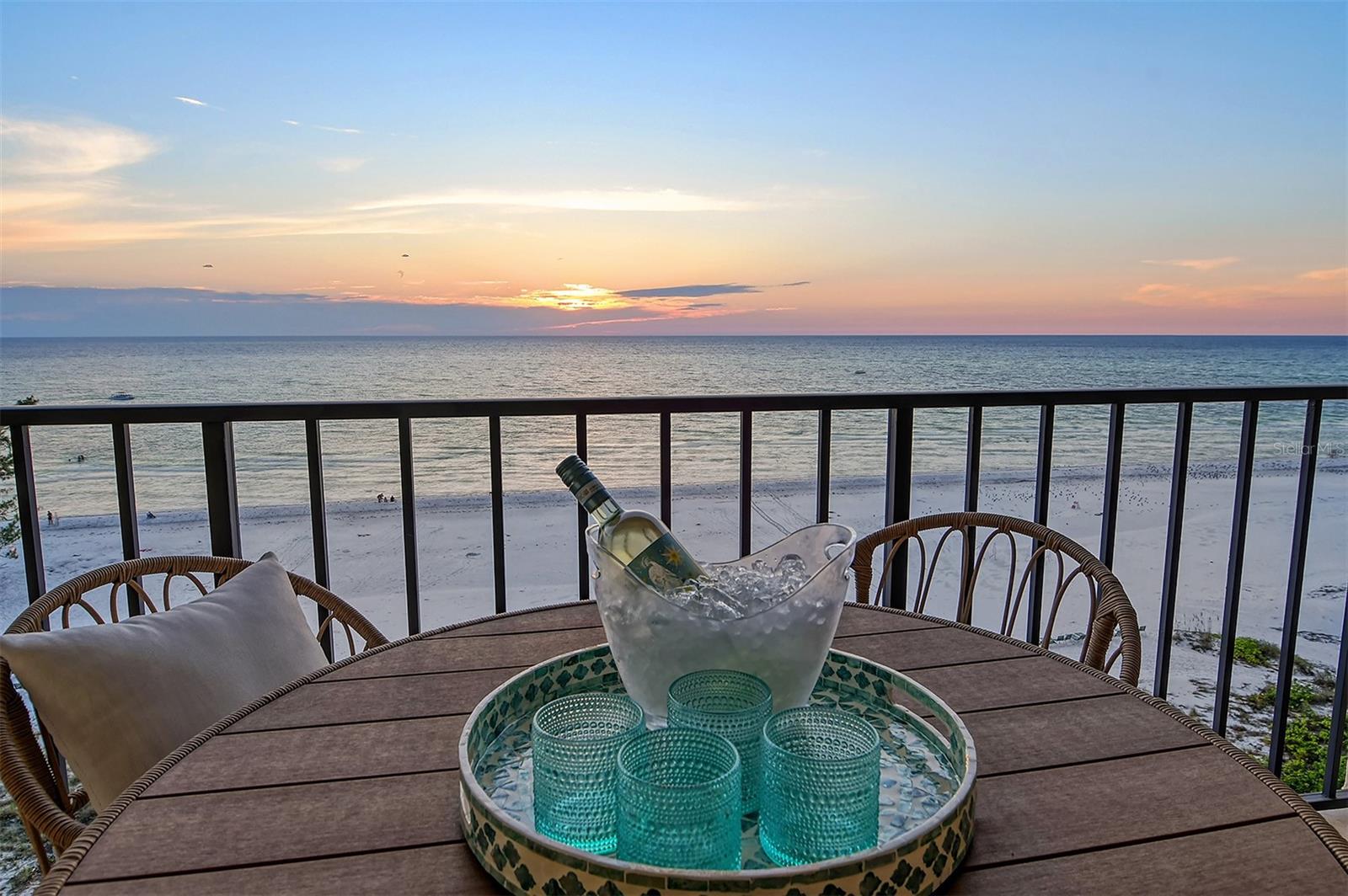 Welcome to Paradise!  This stunning, 2022-2023 REMODELED, open concept 9th floor residence in the premiere GULF FRONT property of Whispering Sands is a true gem.  Offering FULL GULF VIEWS and overlooking 800’ of your own private white crystal quartz beach - consistently voted among the best in the US - this condo is also being offered TURNKEY FURNISHED, making it easy to move right in and start enjoying your new idyllic Siesta Key lifestyle.  As a highly desirable END UNIT, it also features an extra side window, flooding the space with natural light and offering additional views of the surrounding beauty.  Wake up to the soothing sounds of the Gulf waves every morning as you enjoy unobstructed panoramic views of the turquoise waters from the comfort of your own private oasis. In the evenings, enjoy breathtaking symphonies of colorful sunsets and Gulf breezes from your private 24’ balcony.  Your peace of mind is a priority with two sets of convenient motorized hurricane shutters.  Cooking and entertaining have never been so stylish and easy in your new chef's kitchen which features beautiful quartz countertops, an 8' breakfast bar, stainless Frigidaire and Whirlpool appliances, built-in microwave, a 5 burner range, soft close drawers & cabinets, and elegant recessed and pendant lighting.  If you’re an early riser, you’ll be rewarded with captivating sunrises from the east facing window in your bright eat-in kitchen.  Durable and easy to maintain, beautiful luxury vinyl plank flooring throughout the unit adds a touch of sophistication.  Both remodeled bathrooms feature quartz countertops and large glassed walk-in showers.  Although it’s furnished with twin beds, the guest bedroom is large enough to hold 2 queen beds.  2015 HVAC.  2023 water heater.  The common laundry serves just 6 units on the floor.  With its luxurious features and turnkey furnishings, this unit represents the epitome of coastal living. Schedule your private showing today and make your dream of Gulf front living a reality!
