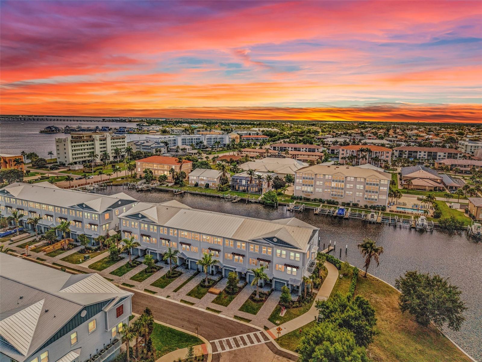 Welcome to SEA HAVEN, where LUXURY COASTAL LIVING meets modern comfort in the heart of beautiful Punta Gorda. This stunning WATERFRONT condominium offers 4 spacious bedrooms, 3 full bathrooms, and 1,867 square feet of thoughtfully designed living space with breathtaking canal views and direct water access.

Step inside to an open-concept floor plan filled with natural light, elegant luxury vinyl flooring, soaring cathedral ceilings, and stylish finishes throughout. The spacious kitchen is designed for both everyday living and entertaining, featuring solid wood cabinetry, solid surface countertops, modern appliances, and seamless flow into the dining and living areas.

Enjoy peaceful waterfront views from your private balcony, or take advantage of the multi-level layout that offers both comfort and privacy. Generously sized bedrooms, walk-in closets, and a spacious upper-level primary suite create the perfect retreat. A PERSONAL PRIVATE ELEVATOR inside the unit adds convenience and accessibility, while hurricane shutters and quality construction provide added peace of mind.

Outdoor enthusiasts will love the INCLUDED BOAT SLIP, private composite dock with electric, seawall, and access to both brackish and saltwater canals. This is truly a boater’s dream, with easy access to Charlotte Harbor, Peace River, and the best of the Florida waterfront lifestyle.

Located in the gated SEA HAVEN community, residents enjoy a sparkling community pool with cabana area, dog park, sidewalks, and beautifully maintained grounds. Just minutes from Fishermen’s Village, downtown Punta Gorda, waterfront parks, shopping, dining, marinas, and Ponce de Leon Park, this location offers the perfect blend of elegance, convenience, and coastal charm.

Whether you are looking for a full-time residence, seasonal retreat, or investment opportunity, this move-in-ready waterfront condo is ready to welcome you home.