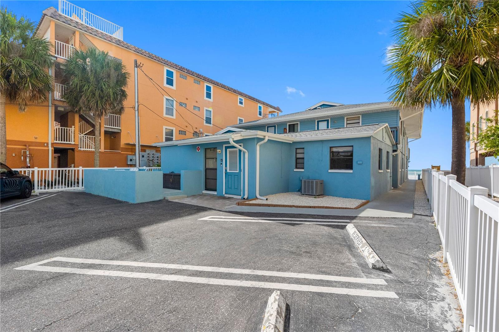Welcome to the beachfront community of Le Mar!  Enjoy this gated, cozy, 9-unit waterfront complex, in desirable Indian Rocks Beach. INCOME PRODUCING! Unit #9 is located on the first floor, and is extremely private, clean and bright, with an assigned parking slip just outside your door!  Easy access and steps away from the beach, with no busy streets to cross!  Investment/Owner User/Short Term Rental Potential (4 day minimum rental)! The unit comes turnkey; including comfortable bedding, furniture, towels, kitchen items, and all the necessities of home. Newer appliances, pavers, pvc fencing, tankless water heater, and on-site washer/dryer. Plenty of storage areas!  Can be used as an income producing beach bungalow, and/or your own private oasis. The low monthly HOA fee of $607 covers insurance, maintenance, basic cable, water, sewer and trash.  Come enjoy sunsets on the shared patio areas, equipped with picnic tables, lawn chairs and outdoor showers for rinsing off the saltwater and Florida's finest sugar sand!  Walk to all of your favorite restaurants, and enjoy the easy-breezy island charm.  Please call the listing agent directly to reserve your showing!