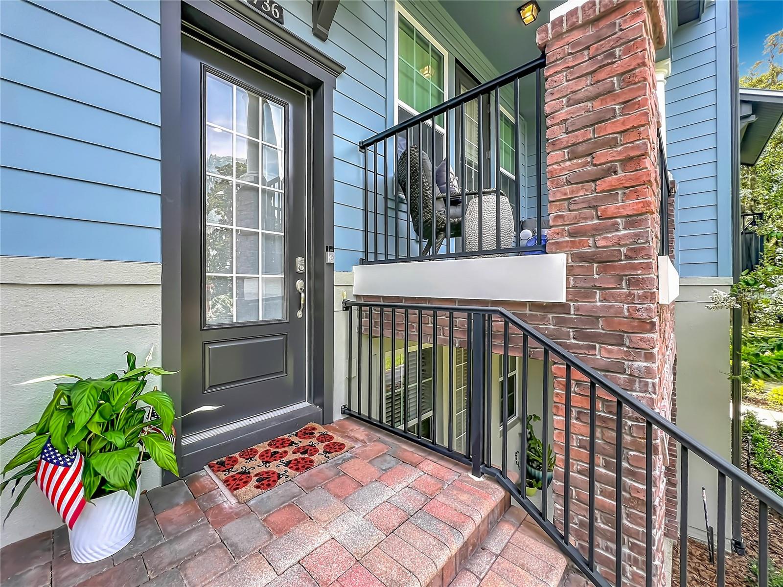 PRISTINE HOME! Luxury three-story townhome located in the highly desirable Hamptons community in the heart of Oviedo, just steps from Oviedo on the Park. This well-designed and versatile floor plan offers comfort, flexibility, and convenient access to an active lifestyle. The first level features a private bedroom and full bath with a separate entrance, along with a covered front patio, ideal for guests, a home office, or multigenerational living. The second level is designed for everyday living and entertaining, featuring an open-concept layout with a spacious family room with luxury vinyl plank flooring, dining area, and a beautifully appointed kitchen with 42" solid wood cabinetry, stainless steel appliances, quartz countertops, a large pantry, and breakfast bar. A convenient half bath is also located on this level, along with a covered balcony for outdoor enjoyment. The third level includes the primary suite with a large walk-in closet with attractive barn door and en-suite bath with dual vanities, an additional bedroom with its own bath, and a conveniently located laundry area. Additional features include a garage with upgraded Shark Coating flooring. Enjoy the community pool and meet your neighbors while taking advantage of the vibrant lifestyle this community offers. Ideally situated within walking distance to restaurants, shopping, and all that Oviedo on the Park has to offer, including community events, concerts, food trucks, and outdoor entertainment. Fresh Exterior Paint, New Roof and A/C.