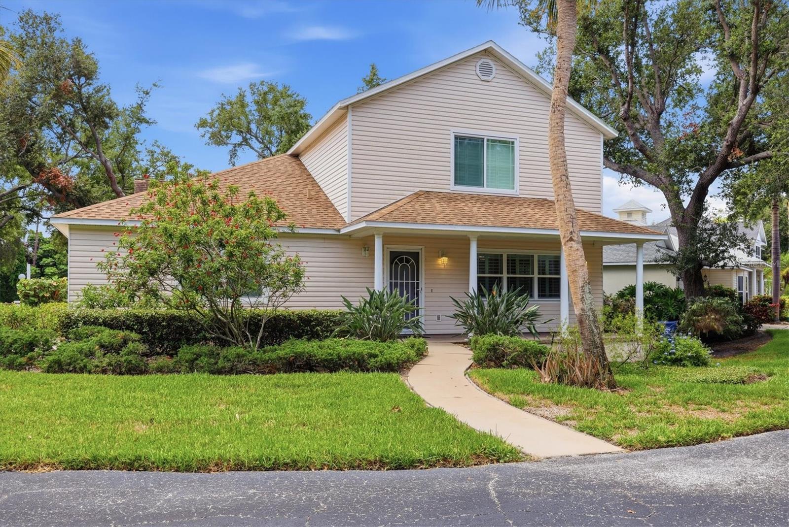 Minutes from Anna Maria Island or Coquina Beach.... sits right between Manatee and Cortez with easy gulf access!!  Beautiful community with tree lined streets and only 42 houses in this cozy New England Style neighborhood.  Freshly painted interior, New HVAC, hardwood floors in the bedrooms, large enclosed Florida Room makes this a perfect home ready to move into!  The open and airy floor plan allows for creative living space on the main floor.   Cape Town Village provides maintenance-free living, covering all ground maintenance, irrigation, internet, cable, and upkeep of the community pool which is located just steps from your front door.  This is an ideal  lock-and-leave lifestyle/home. Flood Zone X.  Perfectly located near shopping, dining, and medical facilities, with outdoor adventures just minutes away at Robinson Preserve. Plus, the stunning beaches of Anna Maria Island —perfect for soaking up Florida sunshine, dining, and unforgettable sunsets.  What's not to love?