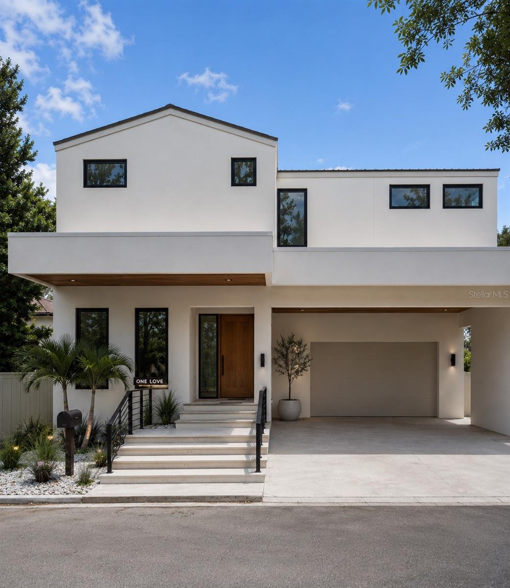 A rare opportunity to own a one of a kind custom built residence in the heart of downtown Sarasota, 1680 Cherry Lane is tucked into one of Laurel Park's most charming streets while being just moments from everything that makes downtown so special. Blending timeless architecture with modern luxury, this brand new residence offers an exceptional lifestyle defined by thoughtful design, refined finishes, and one of Sarasota's most coveted locations.

Spanning 3,128 square feet, this thoughtfully designed two story home features five bedrooms and four bathrooms, including a first floor primary suite and an additional main level bedroom that can easily function as a private office, guest suite, or den. Upstairs, three additional bedrooms provide flexibility for family, guests, or multigenerational living, creating a floor plan that is equally suited for everyday living and entertaining.

At the heart of the home, the open concept living spaces are centered around a beautifully appointed chef's kitchen featuring premium Thermador appliances, custom cabinetry, quartzite countertops, and an oversized island that seamlessly connects the kitchen, dining, and living areas. Expansive PGT impact rated windows and doors flood the home with natural light while creating a seamless connection to the outdoor living spaces, while the private pool provide the perfect backdrop for year round entertaining and relaxation.

Located within the highly sought after Southside Elementary School district, this exceptional residence is just minutes from downtown Sarasota's acclaimed restaurants, boutique shopping, Burns Court, Bayfront Park, Marina Jack, the city's vibrant arts and cultural scene, and Sarasota's world renowned Gulf beaches. Combining custom craftsmanship, luxury finishes, and an unbeatable location, 1680 Cherry Lane presents a rare opportunity to own a brand new custom home in one of Sarasota's most desirable neighborhoods.