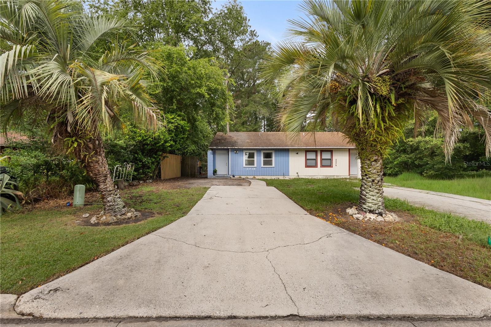 Investor Opportunity awaits! This 1/2 duplex offers a great investment opportunity or first-time home buyer option. This 2 bedroom, 2 bathroom home features a cozy living, kitchen and dining space for an open area to gather, cook, eat and relax. Stepping into the primary bedroom, you'll find an ensuite bathroom and a large addition that could be used for storage, work-from-home space, hobbies, or other possibilities! The backyard is fully fenced with a shed. The roof is only 8 years old (2018), A/C is 9 years old (2017), Water heater is 5 years old (2021). There is a community playground nearby as well! Call to schedule your viewing today! List Agent is Related to Owner.