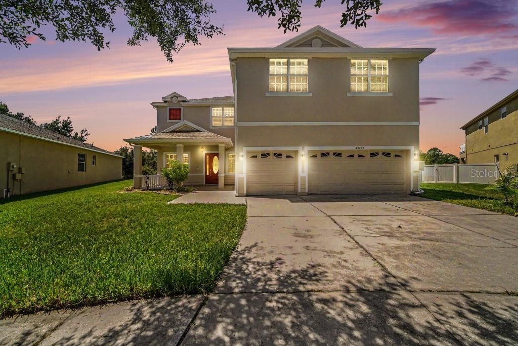 Welcome to this spacious 5-bedroom, 4-full-bath home offering approximately 4,188 square feet of living space in the desirable gated community of Live Oak Preserve. With generously sized rooms and a versatile floor plan, this home provides plenty of space for comfortable everyday living, working from home and entertaining.

The first floor features large, beautiful tile flooring, while the second floor has attractive laminate flooring. The inviting eat-in kitchen offers stone countertops and connects easily to the home’s multiple living and dining areas. A standout feature is the expansive great room, complete with custom wall-to-wall wood cabinetry that provides abundant storage and an impressive built-in look. Use this as home theater, game room, play room or to run a home based business.

The spacious primary suite includes ample closet space and a private bathroom. Four additional bedrooms and a total of four full bathrooms provide flexibility for guests, home offices, hobby rooms or multigenerational living. The property also includes a three-car garage.

Step outside to enjoy the private heated pool and spa, creating the perfect setting for year-round relaxation, entertaining and enjoying the Florida lifestyle.

* New exterior paint
* New 2nd floor AC
* Washer - 2 years old
* Reverse osmosis water filtration system for drinking water
* All restrooms have bidets
* Quite neighborhood with many families with kids
* Swimming pool comes with an automatic pool robot

Residents of Live Oak Preserve enjoy access to community amenities including a clubhouse, swimming pool, fitness center and recreational facilities. Conveniently located in New Tampa, the home is within 10 minutes from Walmart, Target, Publix, Aldi, LA Fitness and a wide variety of restaurants, as well as convenient access to shopping, healthcare and major roadways. Schedule your private showing and discover the space, comfort and convenience this beautiful home has to offer.