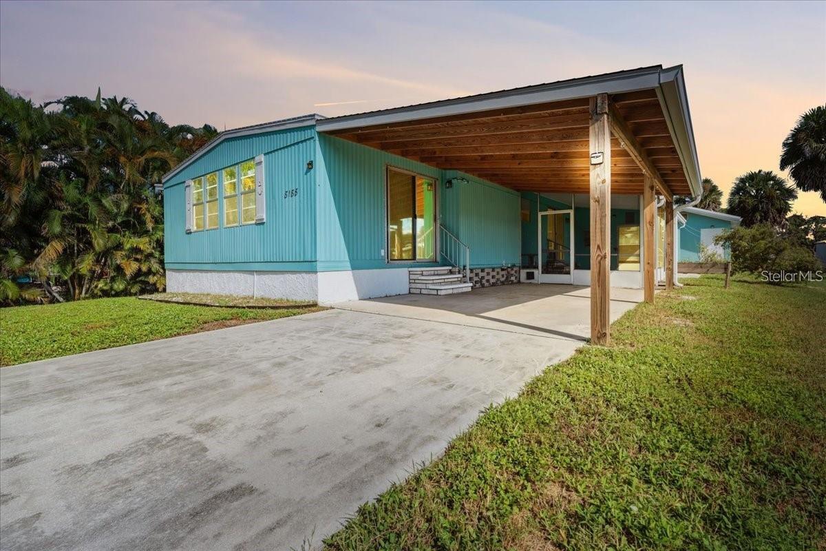 Discover the potential of this charming 2-bedroom, 2-bathroom home nestled in one of Englewood's most sought-after waterfront neighborhoods. Ideally located just minutes from beautiful Gulf beaches, popular restaurants, shopping, and grocery stores, this property offers the perfect balance of convenience and relaxed coastal living.

Situated directly across from the scenic Lake View Canal and community boat dock, this home presents an outstanding opportunity as a seasonal rental, vacation retreat, investment property, or your next renovation project.

Inside, you'll find a bright, versatile floor plan featuring a welcoming entryway and a spacious study or den that's ideal for a home office, media room, or additional living space. The open-concept living area flows seamlessly into the eat-in kitchen, complete with a center island, stainless steel appliances, and modern finishes. An adjoining dining area is filled with natural light, creating the perfect setting for everyday meals or a cozy coffee nook.

Unwind in the enclosed screened lanai, where you can entertain guests or simply enjoy peaceful evenings with refreshing waterfront breezes.

The primary suite offers a walk-in closet and an en suite bathroom with dual vanities, while the guest bedroom and beautifully appointed second bathroom featuring classic wainscoting provide comfortable accommodations for family and visitors alike.

Outside, the generously sized backyard includes a storage shed with a dedicated workspace, offering endless possibilities for hobbies, DIY projects, or additional storage.

Whether you're searching for an investment opportunity, a winter getaway, or a place to make your own, this property is full of potential in an exceptional location. Schedule your private showing today and imagine the possibilities!