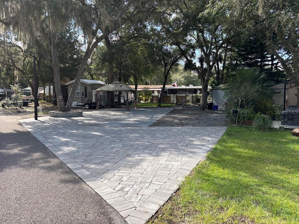 DEEDED LOT – FULL TIME OR PART TIME! Great location! This Lot offers plenty of room for your unit, cars & toys - Also large metal shed to store your extras in. Professionally installed pavers with a small grass area in the back, which is great if you have a small dog or pet. Don't let this one slip by. MOTIVATED SELLERS - Reconnect with nature and make your memories at the popular Salt Springs Resort. Salt Springs Resort is a gated resort / campground located in the heart of the 383,000-acre Ocala National Forest and on the shores of Little Lake Kerr in Salt Springs, Florida.