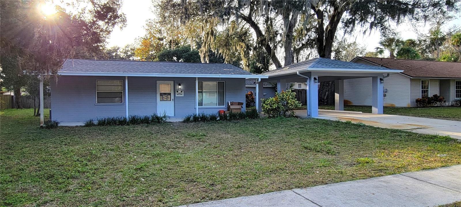 Features: This charming concrete block home has undergone a complete remodel and upgrade. Say goodbye to carpets--luxury vinyl flooring now graces the interior. Freshly painted walls, a brand-new AC system, and elegant granite countertops enhance the living space. Bonus: The home boasts an adorable sunroom with expansive views of the spacious yard. Location: Conveniently located just a few miles from the beach. A perfect retreat! LARGE YARD and HUGE carport. Owner will collect $200 toward electricity, each month and $75 toward water and sewer, each month.
