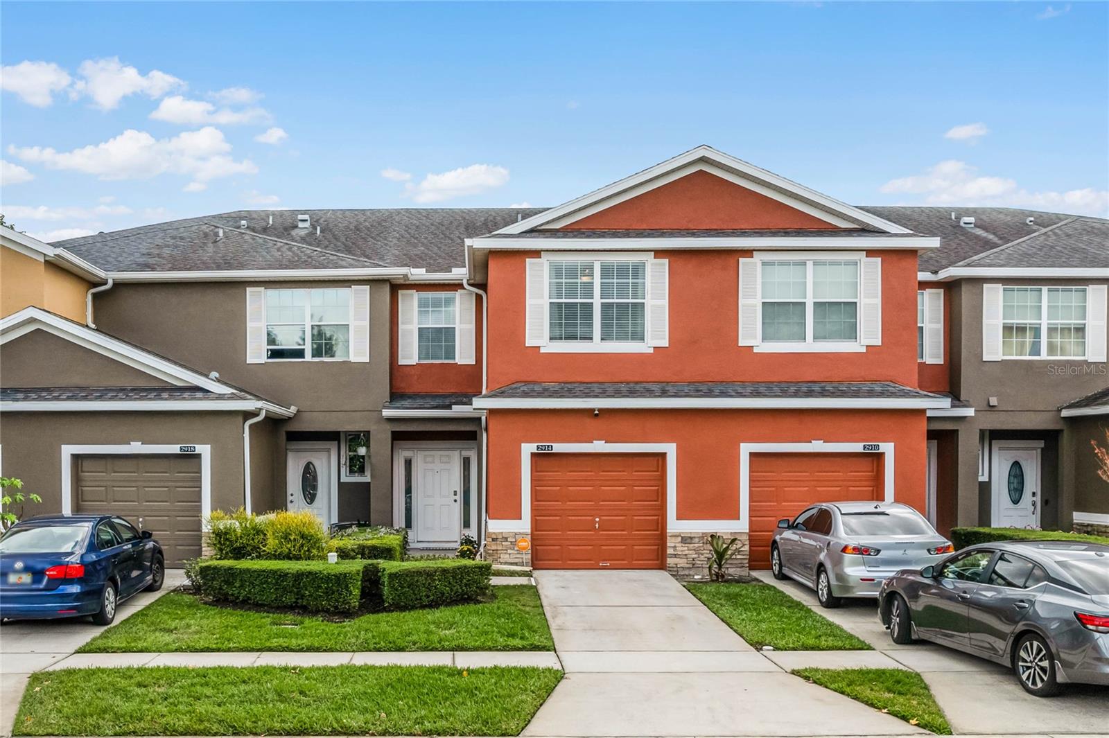 Welcome to your dream home in the charming Camden Landing at Wyndham Lakes community! This stunning 3-bedroom, 2.5-bathroom townhome, complete with a convenient 1-car garage, is a perfect blend of comfort and style. Lovingly maintained and recently updated, this home boasts new hardwood flooring, beautifully renovated bathrooms, modern fixtures, new AC units, and updated lighting. As you step inside, the open floor plan, high ceilings, and abundant natural sunlight immediately create an inviting and spacious atmosphere. The kitchen, open to the dining room, features sleek granite countertops, stainless steel appliances, and an abundance of cabinetry – ensuring ample space and easy reach for all your kitchen tools. Upstairs, the spacious primary bedroom awaits, offering not one, but two closets, and an ensuite that's sure to impress with a stunning glass bowl dual sink vanity and framed glass shower with gorgeous tile. Two additional guest bedrooms, a well-appointed guest bathroom, and a convenient laundry closet complete the upper level – say goodbye to carrying laundry up and down the stairs! Outside, the screened-in lanai is your private oasis for relaxation. It's the perfect spot for morning coffees or unwinding after a long day. Living here is about more than just the home – it's a lifestyle. The community offers a pool, clubhouse, tennis, and basketball courts, all maintained for you, so you can enjoy your free time without the hassle. Location is key, and this home has it all. It's centrally located near Lake Nona/Boxi Park (10 min), The Loop for shopping, dining, and entertainment (20 min), Disney (25 min), Medical City (7 min), and the Orlando International Airport (12 min). Everything you need and more is just minutes away. This home is as convenient as it is beautiful, so embrace the easy life and schedule your private showing today!