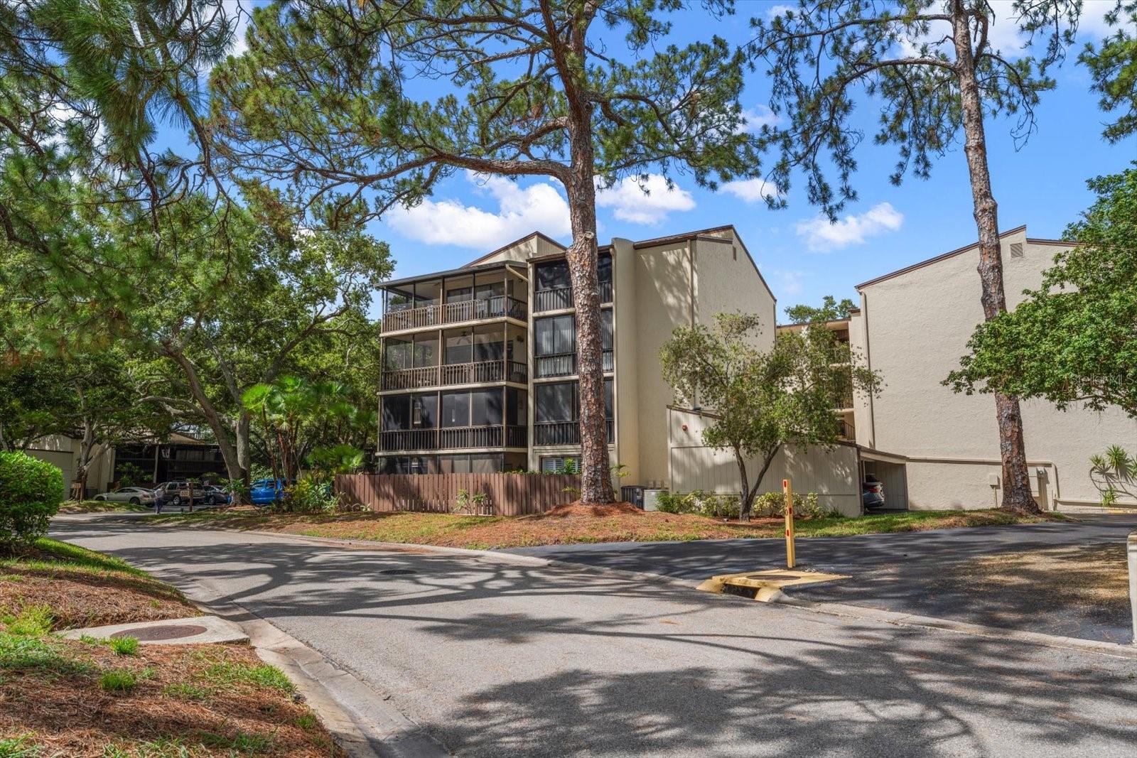 Virtually Staged. Bring your vision and unlock the potential of this spacious second-floor condo in Largo’s peaceful Forestbrook community. This 2-bedroom, 2-bathroom home offers 1,460 square feet of living space, large rooms, an open living and dining area, and plenty of storage. The split plan  layout is ready to be updated and made your own. The wraparound screened balcony is the star of the home. Large sliding glass doors keep it in full view and make it easy to enjoy from the main living areas. It is the perfect place for morning coffee, quiet afternoons, or relaxing in the Florida weather. Unit 624 is located toward the back of the community, offering a more private and peaceful setting. While the condo needs cosmetic updates, several key improvements have already been completed, along with being freshly painted, the electrical system has been updated, water heater (2024), and three new bathroom vanities. This condo also includes a rare garage—one of only eight garages in the entire Forestbrook Condominium Community. Forestbrook offers a park-like setting next to East Bay Golf Club, a community pool, and remote-controlled resident-only access to the golf course. Its central Pinellas County location makes it easy to reach shopping, dining, beaches, airports, and daily services. The space is here. The balcony is impressive. The garage is rare. Bring your ideas and make Unit 624 your own.