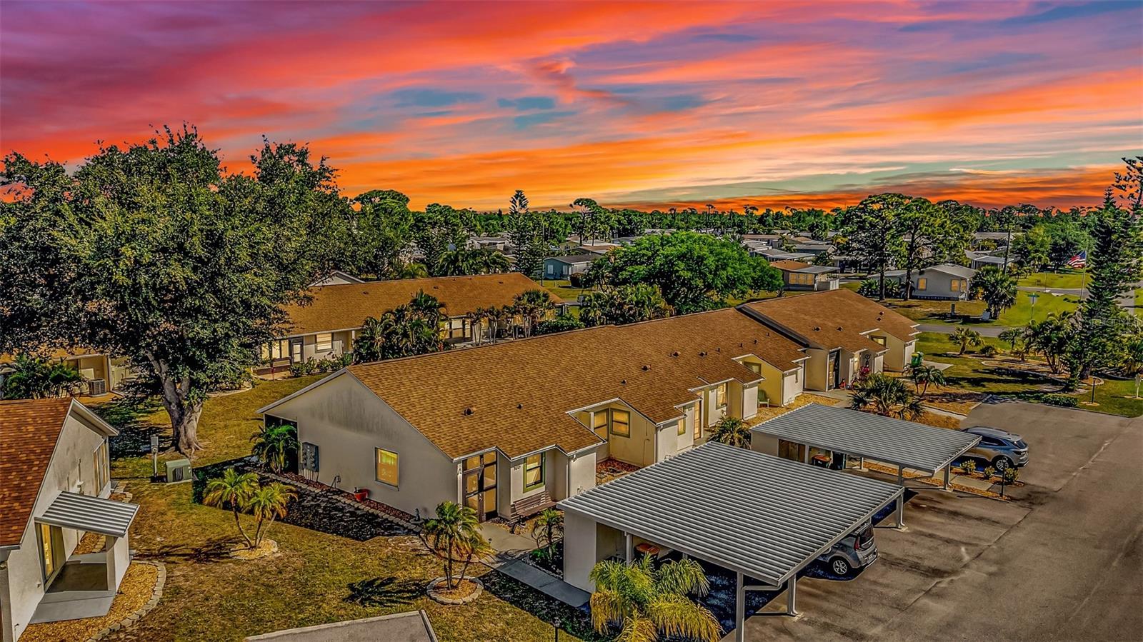 Set on the Cape Haze Peninsula, this condo offers an easygoing Southwest Florida lifestyle in a community of single-story buildings close to beaches, restaurants, and live entertainment, with Venice and Sarasota just a short trip away. From the reserved covered carport with attached shed, you can walk right into the end unit and feel at home in the spacious living and dining area, full kitchen, and separate laundry/utility room. The Florida room adds flexible bonus space and connects both to the back door and the primary ensuite, creating a comfortable flow for everyday living. With the guest bedroom positioned at the front of the condo and the primary suite tucked farther back with a walk-in shower, the layout offers a nice sense of separation. Out back, the patio opens to a garden-style area that invites quiet mornings, outdoor meals, or an afternoon with a good book. A heated community pool, and plenty of storage for beach gear complete the picture of relaxed Florida living. It's a lifestyle you will love especially since it turnkey furnished and ready for its new owner!