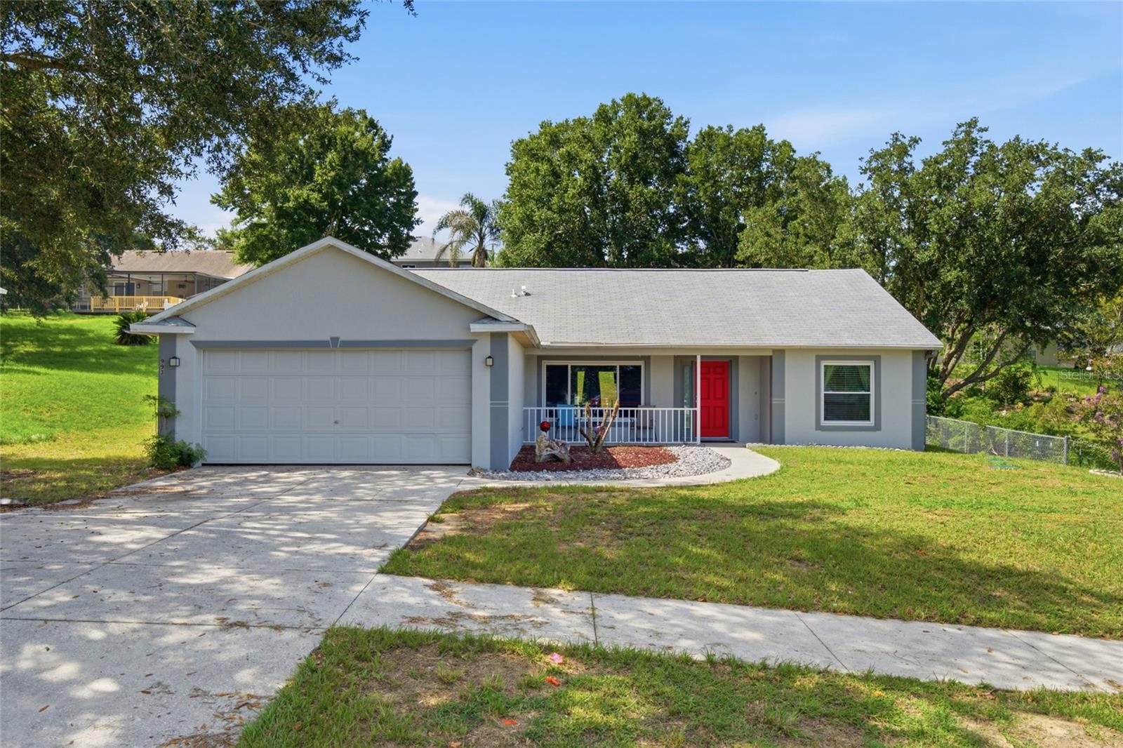 Welcome home to this well-maintained 3-bedroom, 2-bath residence offering over 1,600 square feet of comfortable living space. The remodeled kitchen, completed in 2022, features beautiful quartz countertops, abundant counter space, and upgraded 42-inch cabinetry that provides exceptional storage and a modern look. Designed with both functionality and style in mind, the
kitchen serves as the heart of the home and opens to the main living areas, making it ideal for everyday living and entertaining.
The home offers a split-bedroom floor plan, with the spacious primary suite featuring a walk-in closet, dual sinks, and a relaxing garden tub. Ceiling fans are located throughout the home for added comfort, and blinds are installed on most windows.
Improvements include, energy-efficient windows installed in 2022, a screened lanai added in 2021, exterior sealing and paint completed within the last few years, and a drain field replacement completed less than a year ago. The carpeting has also been updated within the past few years, while tile flooring is found in the foyer, kitchen, and dining areas. Step outside to enjoy the screened lanai overlooking the backyard, where a ready-to-use fire pit area creates the perfect setting for relaxing evenings with family and friends.
This move-in ready home combines thoughtful updates, functional living spaces, and outdoor enjoyment in one attractive package.