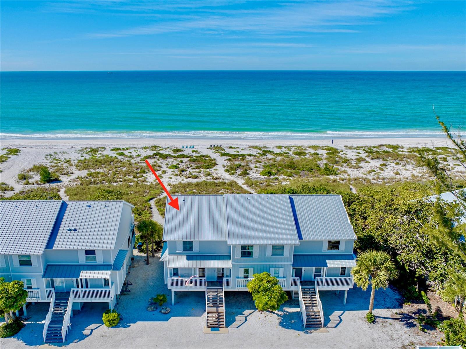 Experience the ultimate costal lifestyle at Sundown #4, a beautifully updated 2-bedroom, 2.5-bathroom end-unit townhome offering 1,276 square feet of stylish living in the Sundown Colony community. This direct beachfront retreat offers breathtaking panoramic Gulf views, a preferred southern exposure, and a prime end-unit location that enhances privacy and natural light.
Inside, you'll find wood-look flooring, a sleek, modernized kitchen, and updated bathrooms—all thoughtfully designed to blend comfort with coastal elegance. The spacious screened lanai and private sundeck off the master suite provide the perfect setting to enjoy the Gulf’s stunning sunsets and serene breezes.
As an end-unit, this townhome benefits from the thoughtful addition of large exterior windows along the dining and living areas, enhancing the bright and airy feel throughout. Additional features include plantation shutter window treatments, impact glass sliders, clear panel shutters for full storm protection, and a durable standing seam metal roof.
Enjoy sunny days at the heated community pool or step directly onto the pristine beach just outside your door. Ideally situated just a mile from the heart of Boca Grande’s historic village and two miles from the southern tip of the island, Sundown #4 puts you only a short golf cart ride from charming shops, acclaimed restaurants, and scenic island trails and state parks.
Meticulously maintained and move-in ready, this is a rare opportunity to own a premier beachfront retreat in the heart of one of Florida’s most desirable island destinations.