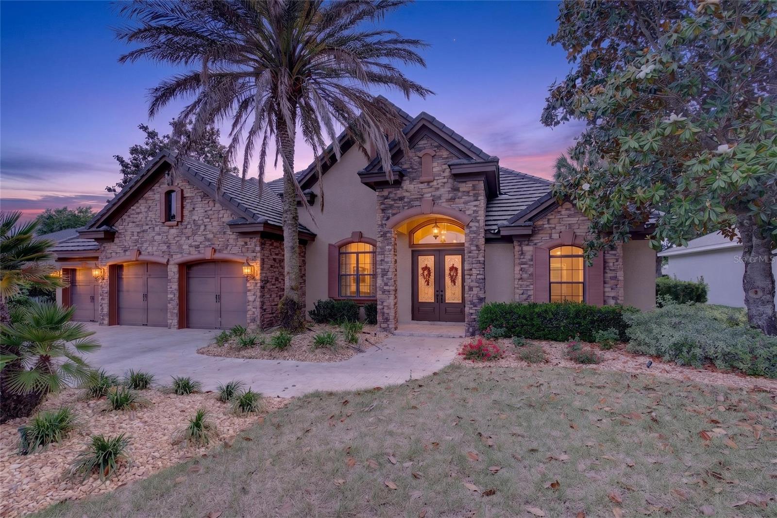 Welcome to this stunning Arthur Rutenberg model home located the prestigious Juliette Falls. This 3,250 square foot, 4 bedroom 3 bath home is filled with "wow" factor, and all FURNITURE IS INCLUDED! From the craftsmanship of the wood coffered ceilings in the Living Room to the drama of the chef's kitchen, each room is full of elegance. The dedicated OFFICE/READING ROOM is the perfect blend of old world beauty and the convenience of a large work space. The kitchen boasts large cabinets, Viking appliances, granite counters and Breakfast Nook. It also opens up to the oversized Family Room which is a perfect set up for entertaining. The Owner's Suite is bright and open yet so inviting. The large bath has a walk in shower and soaking tub. But the room that will be the most talked about is the perfectly appointed Gentleman's Game Room. With poker table, bar with a fridge and a sliding door that opens up to the lanai, this definitely feels like straight out of a country club. The outdoor area is nothing short of breathtaking! The very large lanai has a TV, Summer Kitchen, Travertine decking and opens up to the massive pool area complete with HOT TUB. The AC units have been overhauled and much of the duct work as well as insulation has been updated. There is also a brand new $7000 water filtration unit and a Generac whole house generator. Located on a premier lot with no rear neighbors and within walking distance to the club house, this is truly a one of a kind experience of a home!