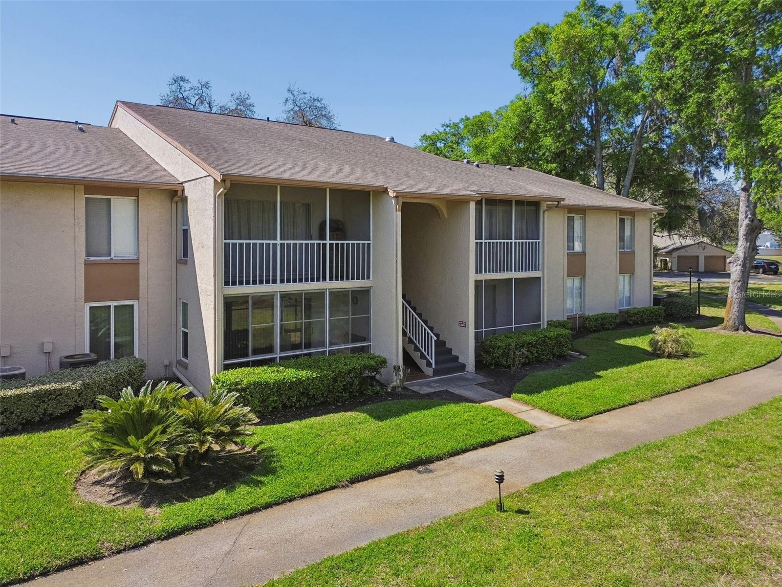 Welcome to your new home located at 13103 Cypress Hill Dr., #118 Unit B2. Affordable second-floor condo in Hudson with tons of potential!! This unit offers a spacious layout and a great opportunity to update to your own style. Enjoy the privacy of no upstairs neighbors and a comfortable living space filled with natural light. Step out onto the large porch-perfect for relaxing, entertaining, or enjoying your morning coffee. Ideal for year-round living, seasonal use, or investment.  Enjoy the outdoors of your new community by relaxing by the community pool or get your tennis racket out or head to the shuffleboard courts. This home awaits you. Conveniently located near shopping, dining, and just a short drive to the Gulf Coast's beautiful beaches.  Don't miss this chance to make this space your own! Please call me for your private showing.