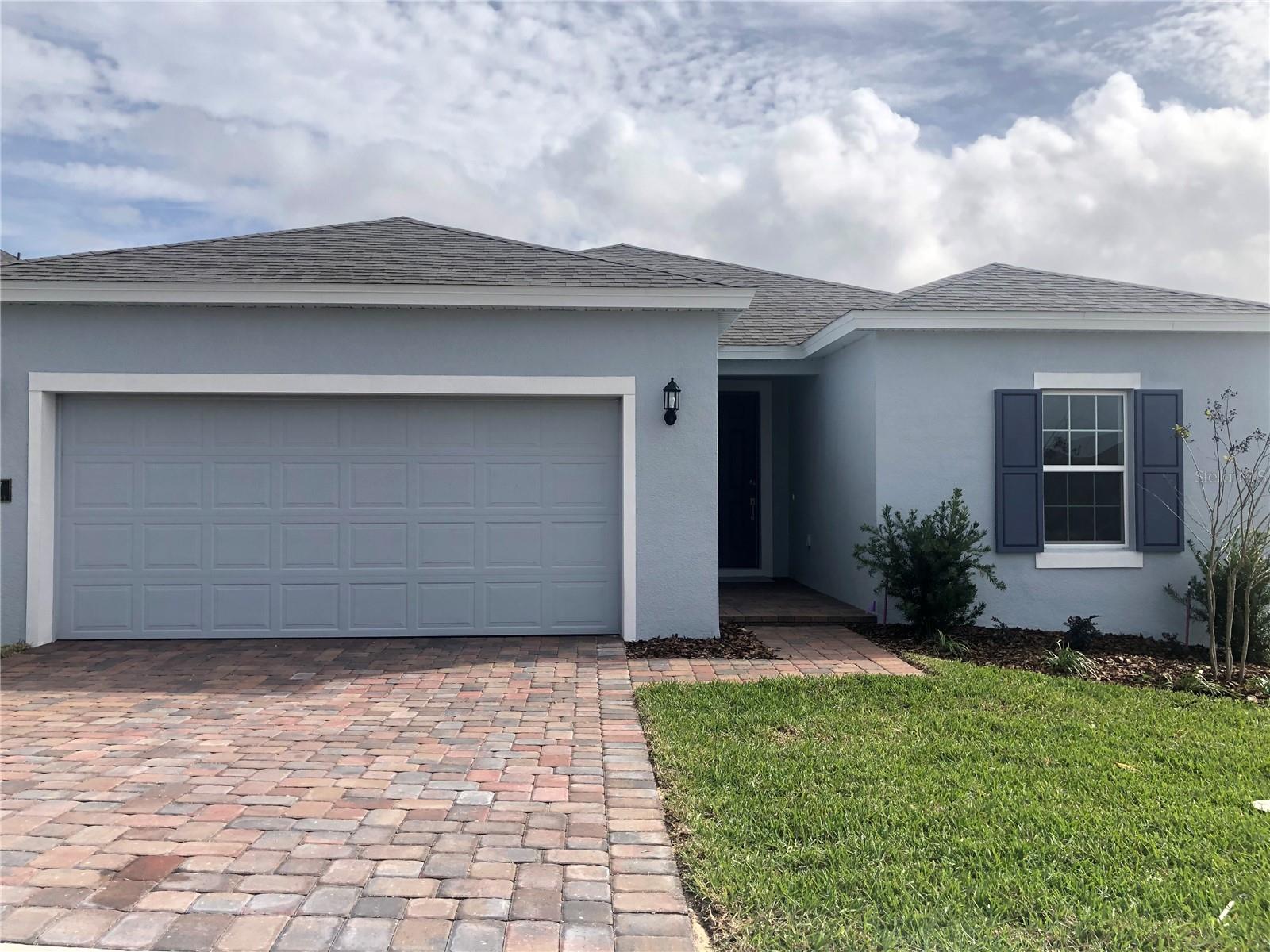 READY NOW HOME!!!! Hillcrest A on Lot 12. Hammock Reserve is a brand-new community located in the middle of Haines City. Enjoy nearby conveniences including grocers, restaurants, shopping, and outdoor activities for the whole family to enjoy. Running errands and spending a night on the town has never been more convenient! Hammock Reserve is just moments away from Publix and popular eateries like Manny’s Original Chophouse. If you prefer to spend a day outdoors, Southern Dunes Golf & Country Club is just a short drive away, or enjoy a day on the water at one of the many lakes that surround this beautiful community. Dream Finders Homes is proud to offer a lineup of our popular Dream floorplans, ranging from 1,407 to 2,110 square feet. Our open floorplans include 8’ ceilings, upgraded kitchens that include luxury tile flooring, designer countertops, classic wood cabinets and a stainless steel kitchen sink. Hammock Reserve is perfect for first-time homebuyers and growing families! Visit us today!