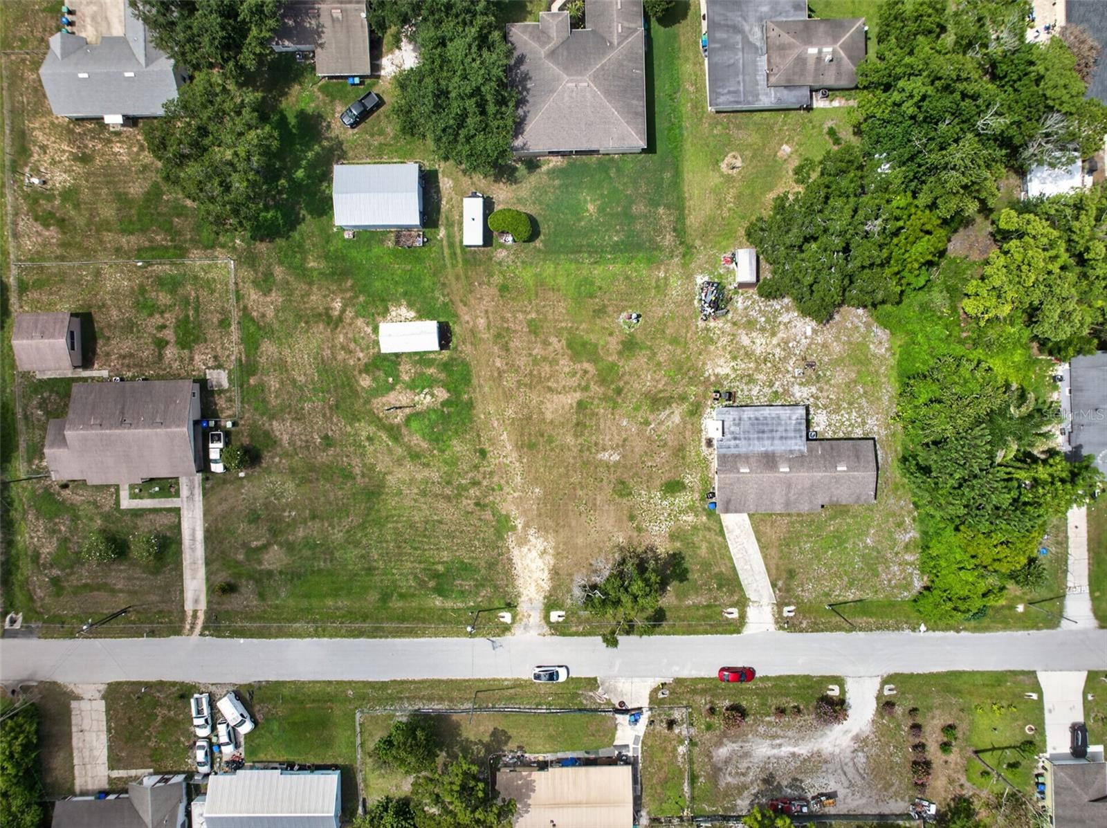 Virtually Staged. BUILDER/DEVELOPER OPPORTUNITY — 1.03-ACRE R-2 ASSEMBLAGE SITE. Located at 212 15th Ave,
Ocoee, FL 34761 and priced at $645,000, this 1.03-acre (approx. 44,867 sq ft) parcel is zoned R-2 and is part of an
active multi-parcel assemblage. The site can be subdivided into up to six 50'x150' lots if the existing home is removed,
or up to four additional buildable lots while retaining the current 3-bedroom, 1-bath, 1,778 sq ft home — a
straightforward way to hold rental income through the entitlement and permitting process. New construction at 315 15th
Ave Ocoee, built on a comparably sized lot, is proof of concept for infill demand in this rapidly appreciating Ocoee
neighborhood. This is a rare chance to acquire meaningful acreage inside an established, in-demand pocket of Orange
County, minutes from downtown Ocoee, with land value driving the opportunity and an income-capable structure
already on site. Buyer and buyer's agent to independently verify all lot-split, zoning, and platting requirements with the
City of Ocoee.