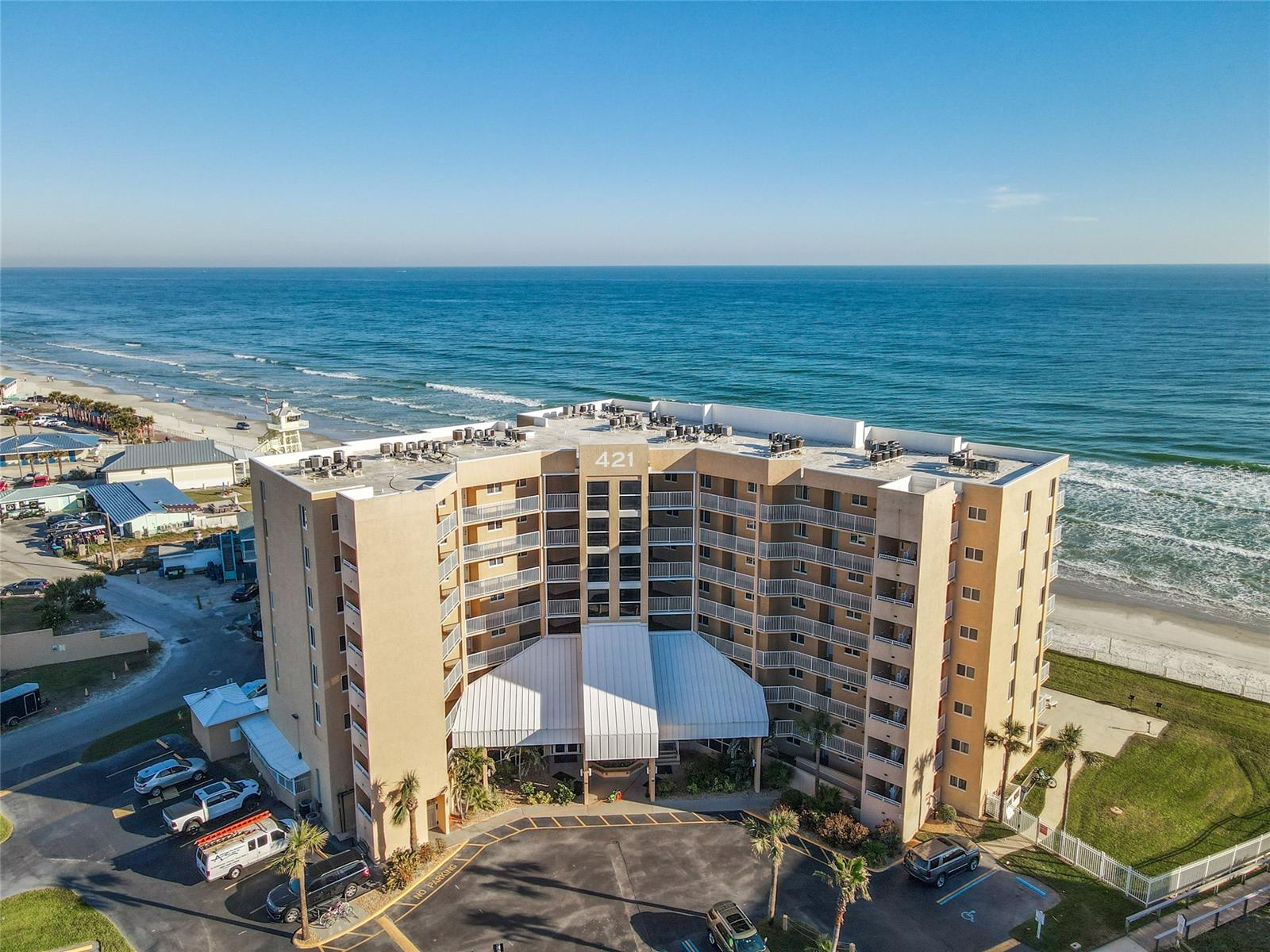 ** PERFECT INVESTMENT OPPORTUNITY/TURN KEY ** NEWLY UPDATED IN 2022 ** NEW KITCHEN APPLIANCES IN 2023 ** If you're looking for a comfortable and spacious condo that's both in the heart of all the action and just seconds from the ultimate relaxation of the beach, then you have found it! You are sure to love watching the sun rise over the ocean from your private patio or the comfort of your living room. Enjoy all the onsite amenities of a fully-equipped community, while basking in the seasonally-heated oceanfront pool with a private gated access from the patio or soak up the sun on the expansive pool deck. COME AND ENJOY THE NSB LIFESTYLE THAT YOU HAVE BEEN DREAMING OF IN THIS 4TH FLOOR UNIT. With just Steps to ALL that Flagler Avenue has to offer: The finest restaurants, shopping, craft stores, clothiers, and much more. ;Water: City