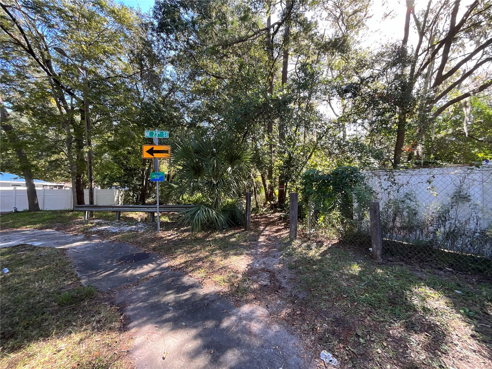One and Half miles to city hall and two and half miles to the University, four and half to VA and Shands Hospital.  Property is located in the Gainesville Enterprise Zone (Discount Permitting, development fees, occupational licenses, sales tax, federal taxes and more.....).  Also available   CITY TRANSIT.