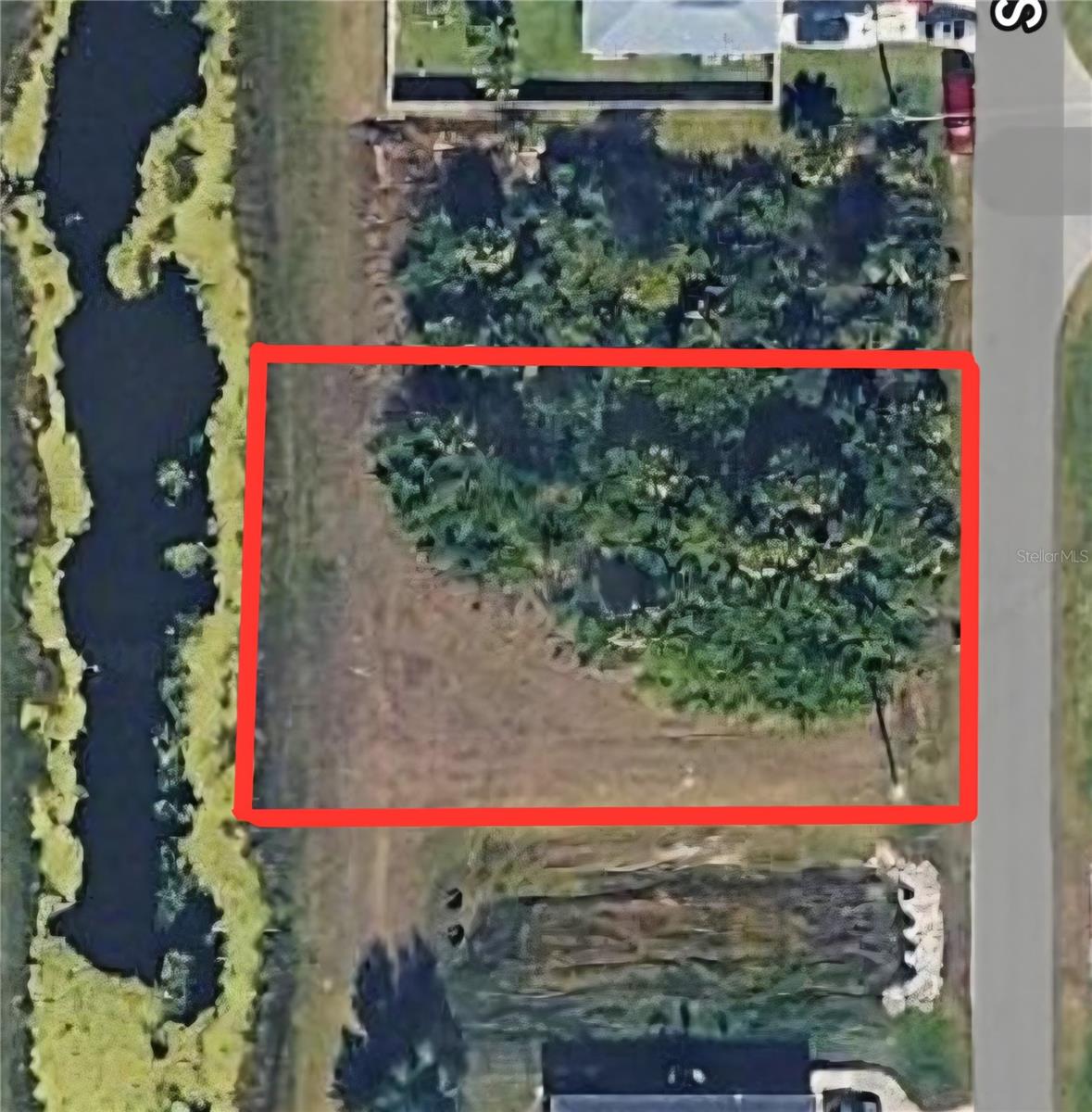 Vacant Parcel on Fordham Waterway in North Port, close to restaurants, shops, and more! Short drive to I-75. City Ordinance has now rezoned this parcel to AC10, allowing ample opportunities for a variety of development options, making it ideal for businesses, agriculture, or even a multifamily residence. With easy access to major roads, local shops, and nearby residential communities, this lot is perfectly situated for convenience and accessibility.