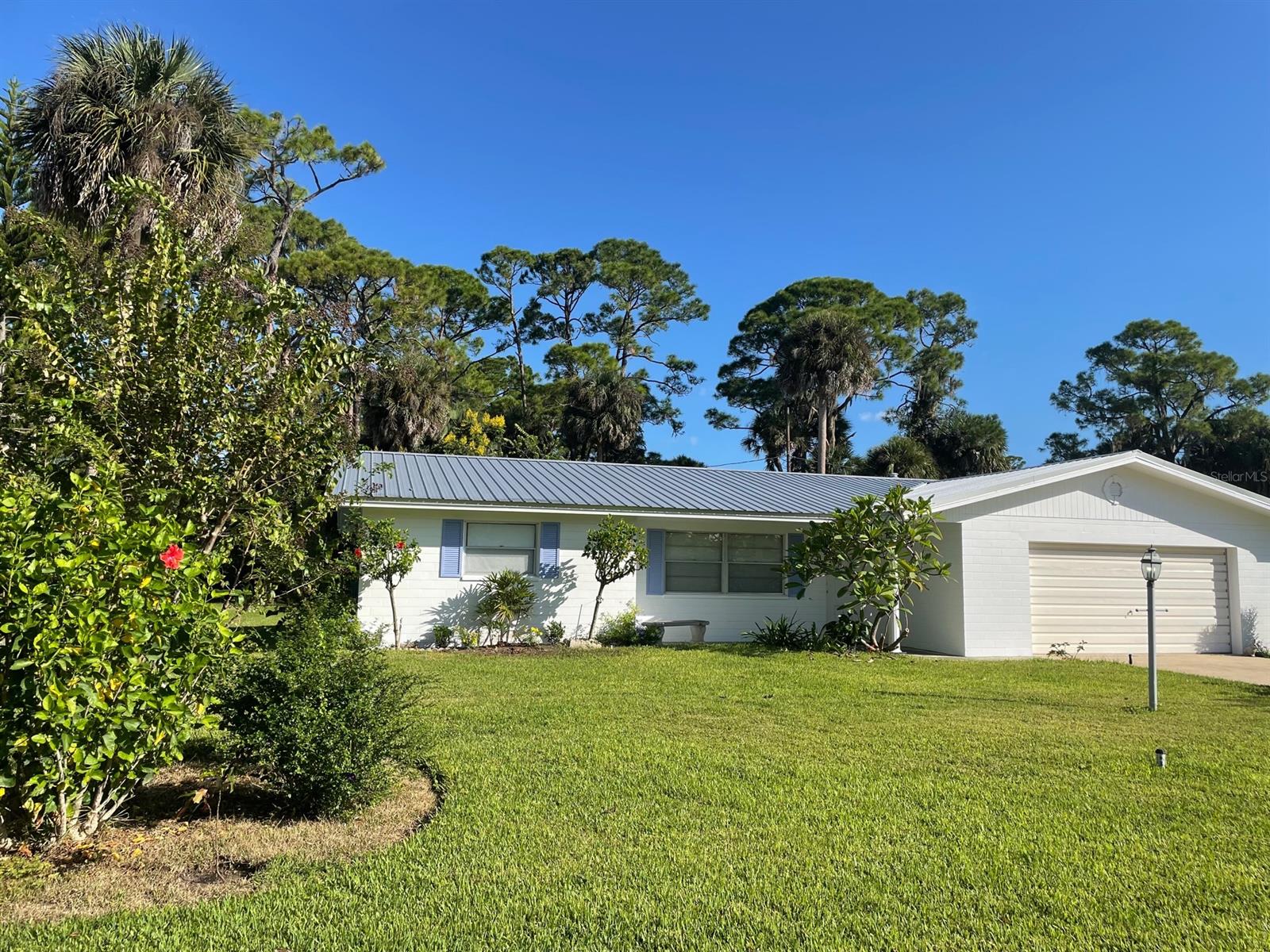 Newly Refreshed Golf Front Home:  Immaculate 3BR/2Ba home near the seventh fairway on New Smyrna Beach’s Municipal Golf Course. Nestled in the family friendly Indian River Plantation subdivision, this home has new carpet in bedrooms and is freshly painted in neutral colors throughout in Summer, 2022. New HVAC in Spring, 2022.  New electrical panel in 2021. Attractive and easy to care for ceramic tile throughout remainder of home. Exterior also freshly painted and newly landscaped in 2022. All metal roof installed in 2016.  Close to schools, churches, shopping, other golf courses and just a short drive or bike ride to the ocean beaches, preserves & boat launches. ;Water: City