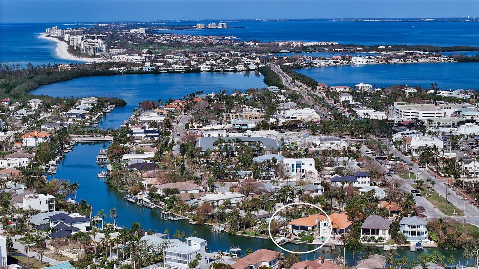 Waterfront  home on St. Armands Circle: A meticulously remodeled retreat that perfectly blends modern sophistication with the charm of coastal living.  Nestled just moments from the sparkling Gulf of Mexico, this property offers unparalleled access to sun-soaked beaches, tranquil waters and the vibrant lifestyle of Lido Key.  From the moment you step inside, you will be captivated by the open floor plan that seamlessly integrates indoor and outdoor living.  The heart of the home is a brand-new gourmet kitchen, thoughtfully designed with new appliances, sleek countertops and a spacious island with ample seating.  Whether hosting lively gatherings or enjoying quiet family meals, this kitchen is as functional as it is beautiful.  This three bedroom home with a spacious office accommodates additional guests for those special events.
 
Built to endure, this home had no damage during the last two hurricanes, giving you the confidence of its sustainability.  The primary living areas are open and inviting, featuring stylish finishes and a calming palette that mirrors the serene surroundings.  Breathtaking sunsets, while the layout flows effortlessly to an outdoor space that is ideal for entertaining. 

Boating enthusiasts will delight in the private boat dock and lift, offering easy access to the bay and  Gulf for endless days of fishing, or just cruising along the coastline.  The outdoor area is a haven for relaxation and a tranquil backdrop for your waterfront retreat.