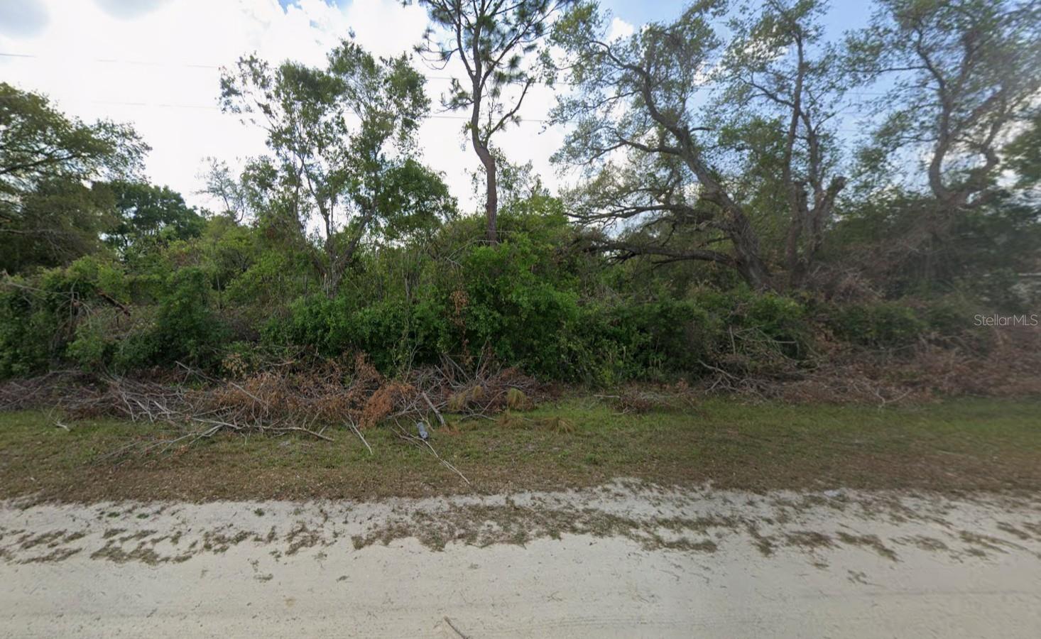 Spacious 0.35-acre double-sized lot in Orange Blossom Ranches, one of Okeechobee County’s established residential areas with homes and manufactured/mobile homes nearby. This parcel offers more room than many standard lots in the subdivision, making it a strong option for a future residence, manufactured home, weekend retreat, or long-term land hold. Enjoy a rural setting with no HOA while staying within driving distance of downtown Okeechobee, local shopping, schools, and Lake Okeechobee recreation. Buyer to verify zoning, permitted use, utilities, access, flood zone, setbacks, and building requirements with Okeechobee County.