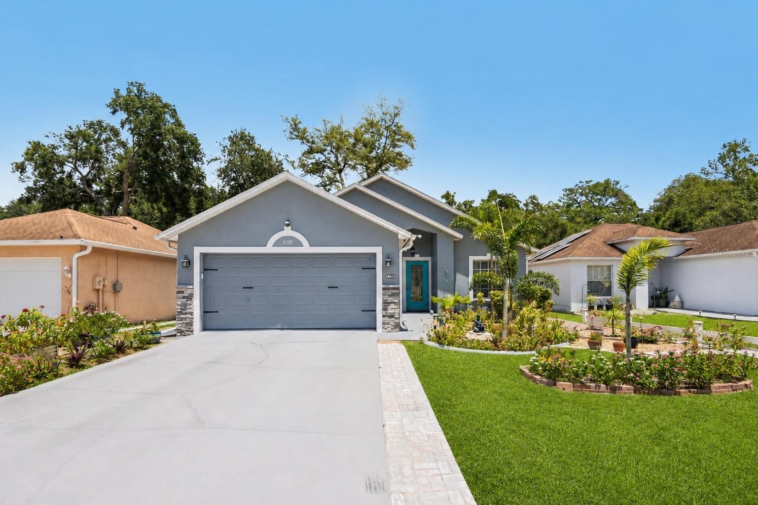Welcome to this beautifully maintained, truly move-in ready 3-bedroom, 2-bathroom home offering the perfect blend of comfort, functionality, and Florida living—with no HOA restrictions. Nestled in a desirable Tampa location, this inviting residence features a thoughtfully designed floor plan with spacious living areas and abundant natural light throughout. The welcoming living room flows seamlessly into the dining area and kitchen, creating an ideal space for both everyday living and entertaining. The kitchen is designed with convenience in mind, offering ample cabinetry, generous counter space, and a cozy breakfast nook perfect for morning coffee or casual meals. Recent updates include re-faced kitchen cabinets (2024), a new refrigerator (2025), and stylish new lighting throughout the home (2025). New flooring installed throughout the residence in 2024 enhances the home's modern appeal. The spacious primary suite serves as a private retreat, while the beautifully remodeled bathrooms provide comfort and style. Updates include a remodeled guest bathroom (2024), additional bathroom renovations (2024), and new toilets (2024). The interior of the home was freshly painted throughout in 2024, and a decorative glass front entry door was added the same year, creating an inviting first impression.
Additional improvements include a new AC system (2026), new AC control panel and vent covers (2025), a new sliding glass patio door (2025), new washer and dryer (2024), and LeafGuard gutters installed in 2024 for added convenience and peace of mind. Step outside to enjoy the screened patio, an ideal spot for relaxing, dining outdoors, or enjoying Florida's year-round sunshine. The fully fenced backyard features new fencing installed in 2025, providing privacy and plenty of room for pets, play, gardening, or future outdoor entertaining. With extensive updates completed throughout the home, there is nothing left to do but move in and enjoy. Conveniently located near shopping, dining, parks, schools, and major commuter routes, this meticulously maintained property offers exceptional value, modern updates, and the freedom of no HOA fees or restrictions. Don't miss your opportunity to own this turnkey Tampa home.