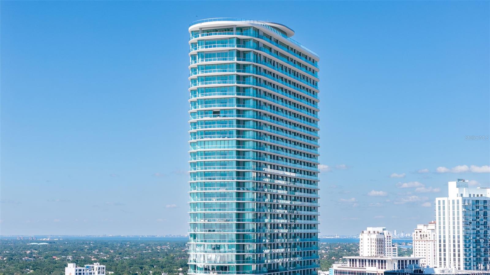 One or more photos have been virtually staged. Experience elevated downtown living at 400 Central, one of St. Petersburg’s newest luxury condominium residences in the heart of the city. Perfectly positioned just steps from Beach Drive, waterfront parks, award-winning restaurants, museums, shopping, and entertainment, this premier address offers the ultimate blend of modern elegance and urban convenience. Residents enjoy a resort-style pool and hot tub, state-of-the-art fitness center, social and entertainment spaces, concierge services, and breathtaking panoramic views of Tampa Bay and the downtown skyline. Unit 3906 is a large 3-bedroom, 3-bath residence featuring many upgrades not found in other units, including tile flooring throughout the entire home, soaring 11-foot ceilings, and a sleek paneled refrigerator for a seamless designer look. With sophisticated architecture, upscale finishes, and an unbeatable walkable location, 400 Central delivers luxury living at the center of everything St. Petersburg has to offer.