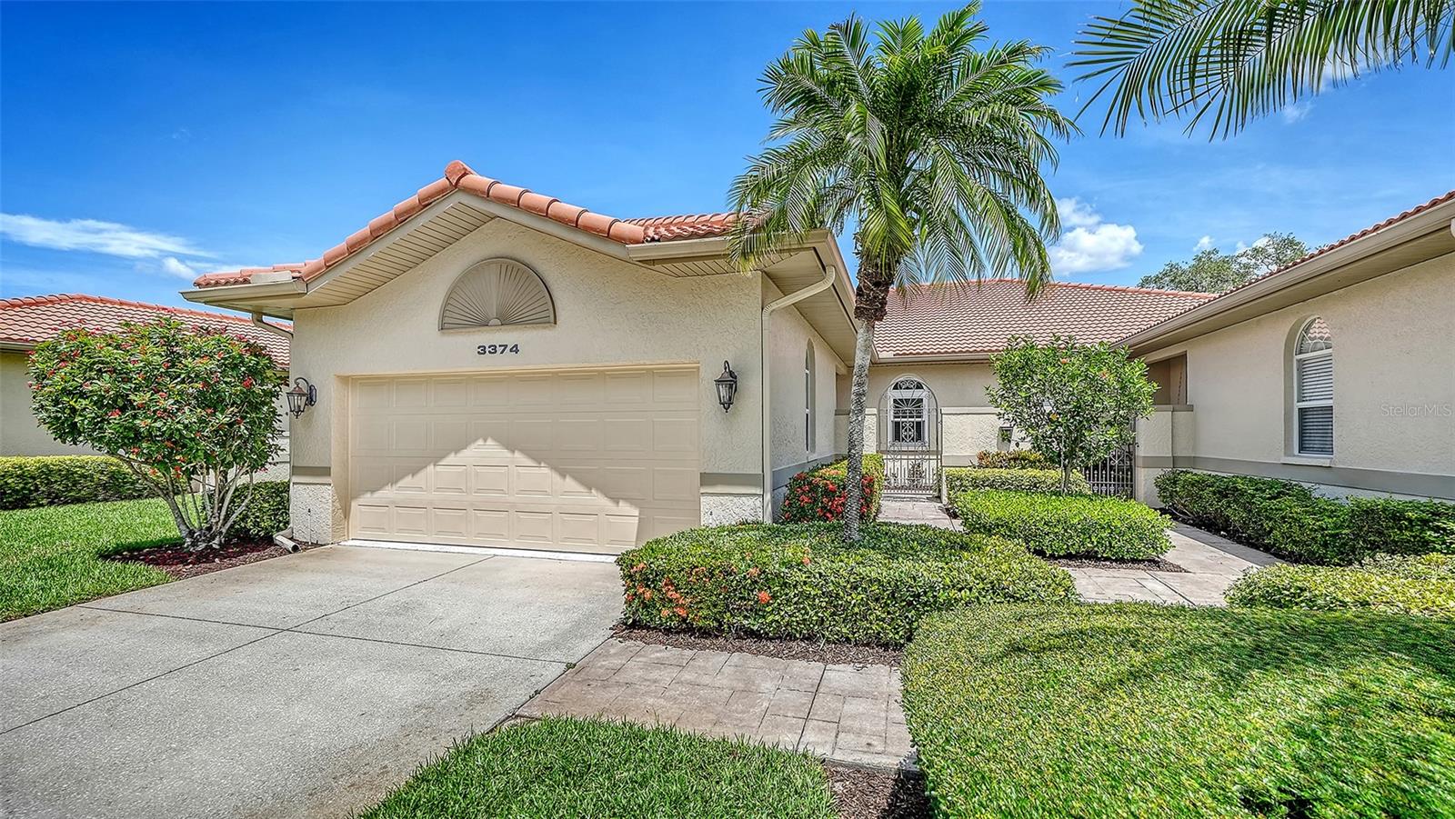 Spectacular golf and lake views, plus hurricane glass for peace of mind, in a phenomenal location! Filled with natural light, this two-bedroom plus den end unit villa features high ceilings with crown molding and walls of glass that beautifully bring the outdoors in. The spacious primary suite offers a walk-in closet, dual vanities and a walk-in shower. Relax on the screened lanai and take in the gorgeous sunrise views over the lake and golf course, perfect for morning coffee, reading or entertaining friends. All just a short distance to the heated community pool and a quick ride to everything The Meadows has to offer. Set on 1,600 park-like acres, The Meadows is a resort-style community just 15 minutes from downtown. Enjoy 14 miles of scenic trails and an available fitness center, junior Olympic pool, pickleball, golf and Har-Tru tennis. You’ll be minutes from award-winning beaches, vibrant arts and culture, Whole Foods, Trader Joe’s, Nathan Benderson Park, Mote SEA Aquarium, Legacy Trail, the future Sarasota Orchestra and University Town Center, a favorite shopping, entertainment and dining destination. A fabulous Florida lifestyle awaits! 2022 A/C system, 2021 water heater, 2014 tile roof (condo's responsibility), above flood plain in zone X.