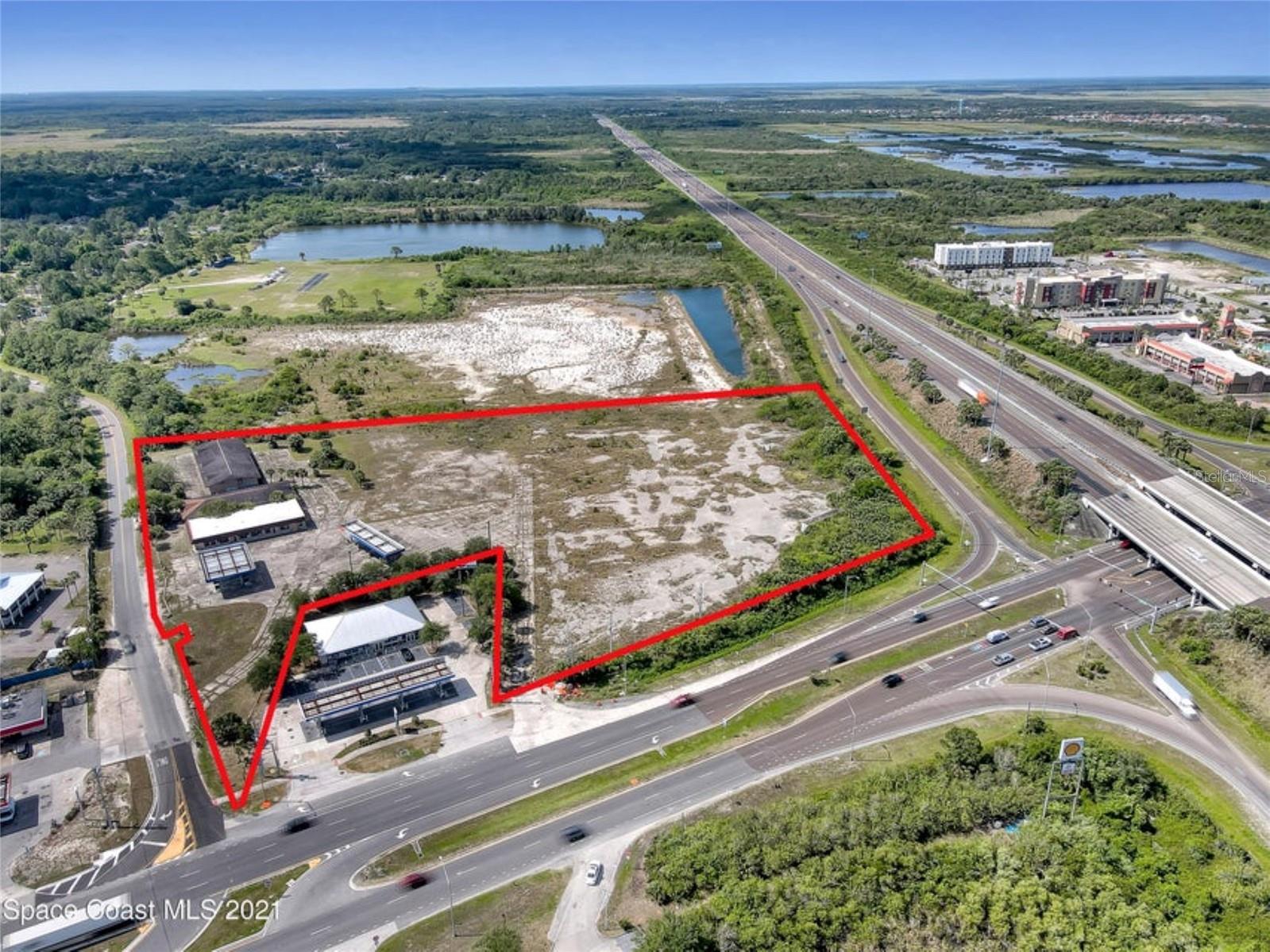 Almost 7 acres of cleared land located on busy corridor of established businesses such as - Walmart, Home Depot, Lowes & other newer businesses currently under construction - leading into Titusville. High & dry. Great access right off the highway from I95 & Rt 50. (Exit 215). Zoning is Regional Commercial (RC) district for general commercial activity. This district is designed to provide for a wide range of permitted uses & conditional uses that offer goods & services of both a convenience and desirable nature to shoppers. Past use as gas station & truck stop. Ingress & egress from (Rt 50) Cheney Hwy and Windover Way. Build a restaurant, retail center, family entertainment venue, hotel, gas station, so many possibilities. Just minutes to Brevard's best beaches & Orlando! Can subdivide.