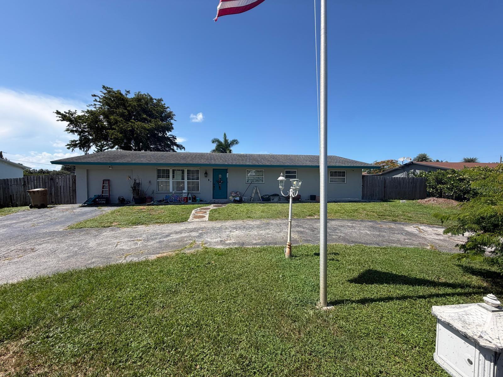 Charming single-family home in Davie, Florida, offering a spacious lot and comfortable layout. This one-story residence includes three bedrooms, two bathrooms, and a two-car garage. Situated on a generous lot, it provides plenty of outdoor space. Nestled in a convenient Davie location, the home offers easy access to major roads, local amenities, and schools—making it a fantastic spot for both convenience and comfort