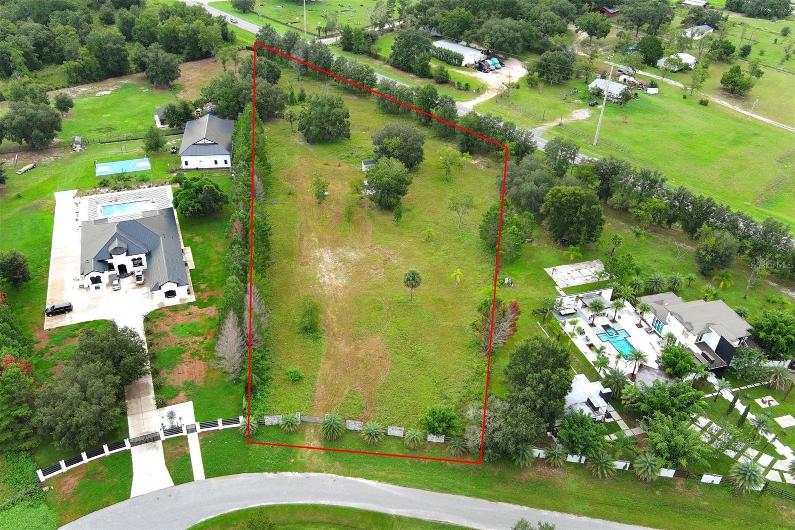 Build your Dream Home on 3.53 Acres - Luxury Custom Homesite with Upgrades

Welcome to Lot 2 of 11 exclusive homesites in this private neighborhood, offering the perfect setting for your dream custom residence. With the freedom to choose your own builder, you can create a luxury home that fits your vision. Deed restrictions require a minimum of 2,400 sq. ft. 

This property already includes major upgrades: metal wire fencing, electricity, private well, septic system with 1 bathroom, storage shed with concrete floor, and a gazebo with fire pit for outdoor enjoyment.
A prime, ready-to-build lot offering privacy, space, and endless possibilities for your custom luxury home.