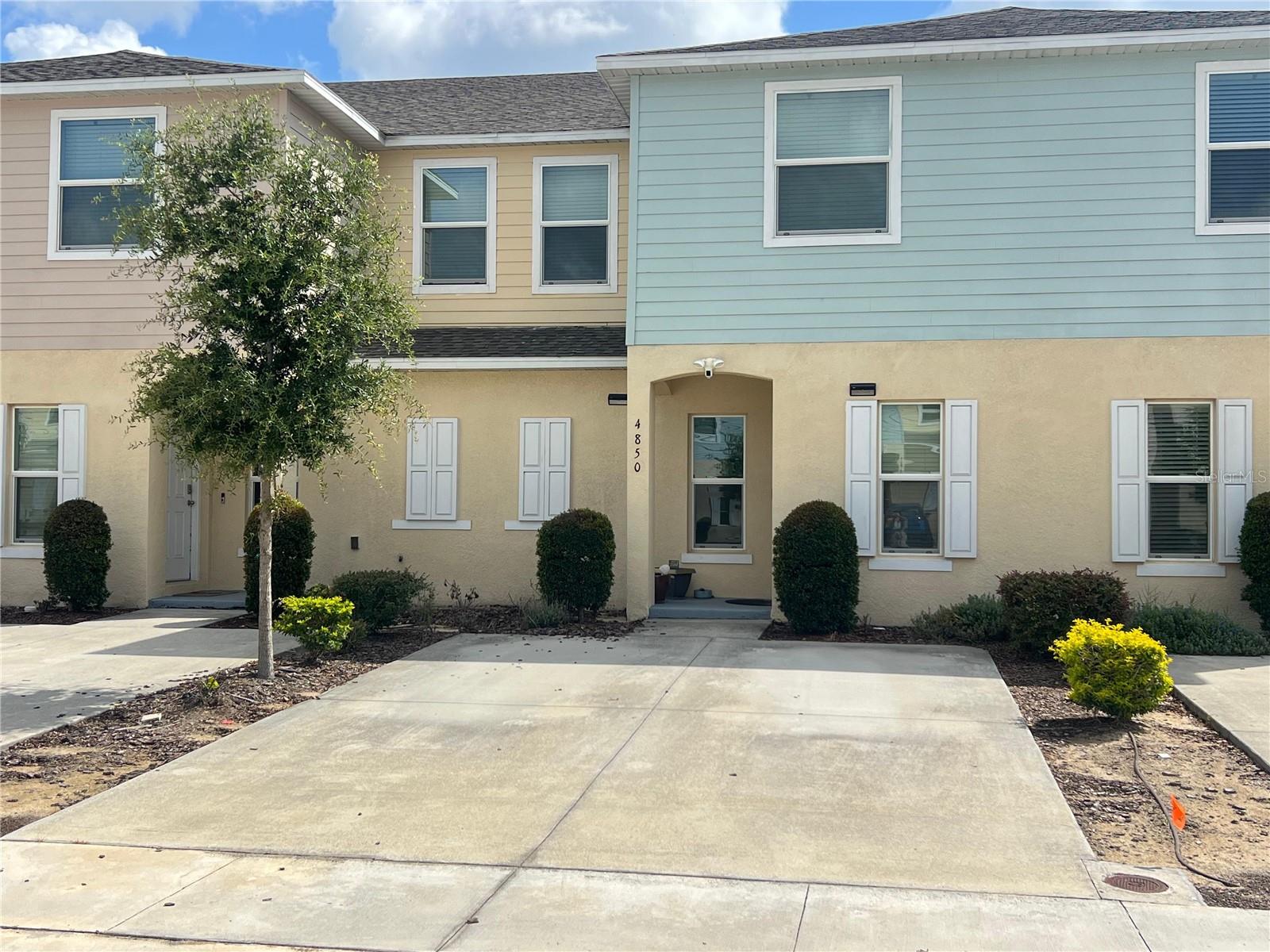 Welcome to this beautiful two-story townhome located in the highly desirable Fiesta Key gated community in Kissimmee. This spacious St. Thomas floor plan features 3 bedrooms, 2.5 bathrooms, and an open-concept layout designed for comfortable living and entertaining. The modern kitchen boasts stainless steel appliances, elegant cabinetry, and a large stone countertop that seamlessly overlooks the bright and inviting living area. Upstairs, you’ll find generously sized bedrooms, including a spacious primary suite with a private bath and ample closet space. Enjoy peaceful pond views from the screened lanai, perfect for relaxing after a long day. Additional features include an upstairs laundry area and extra storage space. Residents of Fiesta Key enjoy resort-style amenities, including two community pools, clubhouse, fitness center, tennis courts, playground, and beautifully maintained grounds. Conveniently located just minutes from Walt Disney World, shopping, dining, schools, hospitals, major highways, and Orlando International Airport. Ideal as a primary residence, vacation home, or investment property.
