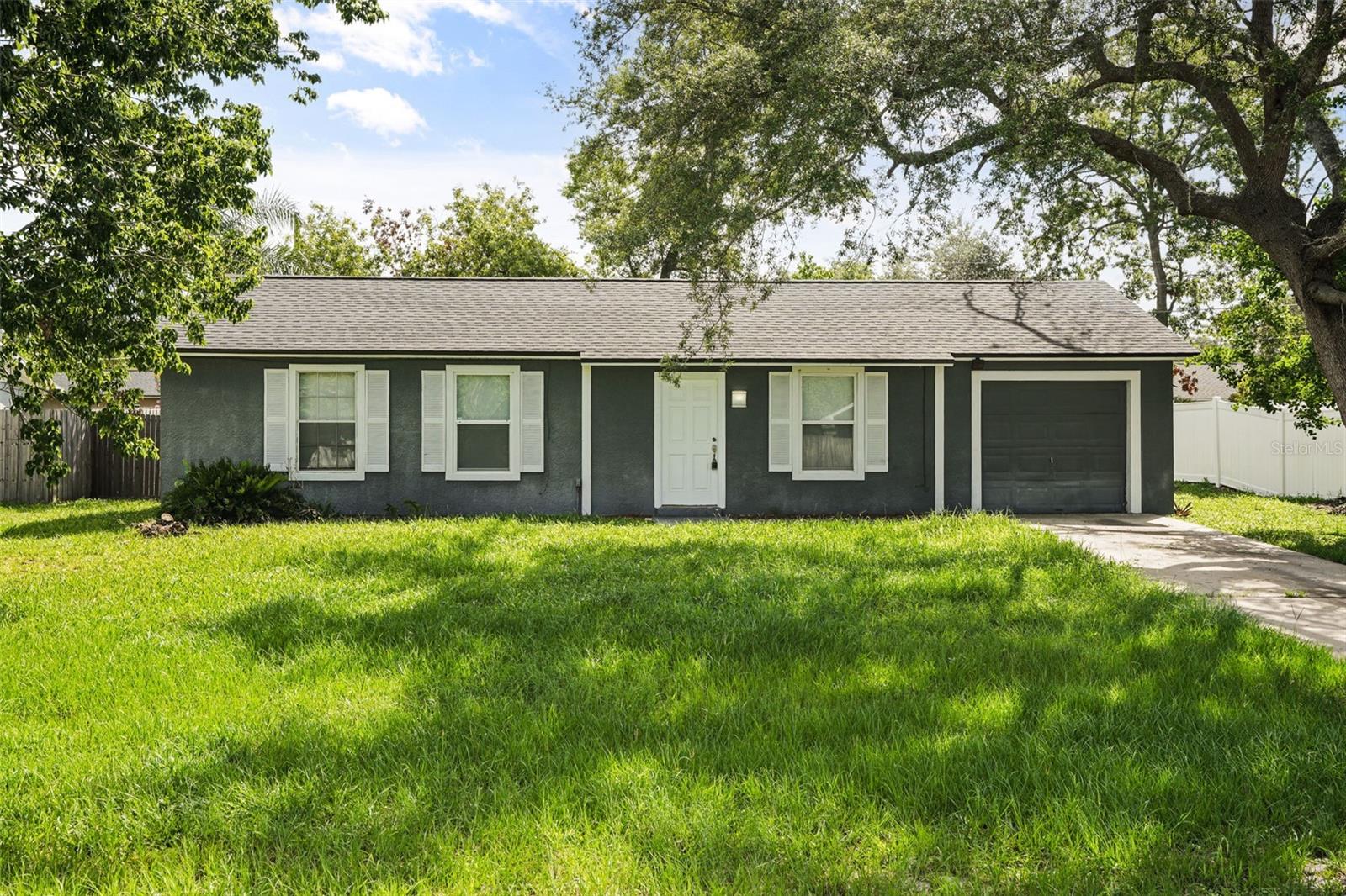 Welcome to 1067 Lyric Drive in Deltona, a great opportunity for a first-time homebuyer, downsizer, or investor. This single-family 3-bedroom, 1-bath home offers a practical layout with a converted garage that provides flexible bonus space for an office, hobby room, playroom, second living area, or extra storage. The bonus room may benefit from some finishing touches, giving the next owner the opportunity to make the space their own. Several big-ticket updates have already been completed, including a NEW roof, NEW kitchen with granite countertops, NEW appliances, and an A/C unit from 2020, giving buyers a strong start while still leaving room to add their own personal touch. Enjoy the screened back porch, spacious backyard, and established Deltona Lakes setting with access to nearby parks, lakes, and outdoor recreation throughout the area. For investors, this home was previously rented for $1,700/month before the kitchen renovation, offering even stronger rental potential with the recent updates. A well-located Deltona home with flexibility, updates, and long-term potential.