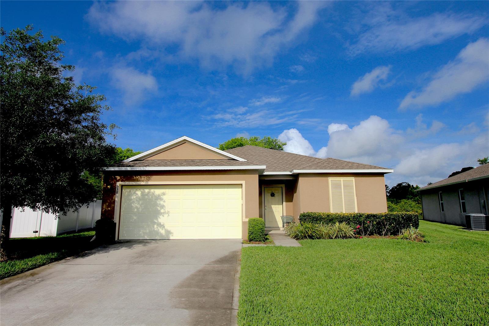 This beautiful 4 bedroom, 2 bath home in Edgewater Lakes is barely 5 yrs-old backing to preserve and private water views! Inside is an open & spacious floorplan with formal living room, dining room & family room. Built in 2016 you'll find yourself surrounded by everything fresh & like new. The kitchen features huge island breakfast bar, dark wood cabinets with black appliances and decorative tile backsplash. The spacious master bedroom offers walk-in closet and nice sized bathroom with dual sinks. The second and third bedrooms share a bathroom plus a 4th. bedroom or office. Other outstanding features include inside laundry with newer washer and dryer. The back yard is great for relaxing or entertaining with Florida room plus fenced yard backing to the preserve.Hurry before this gem is gone ;Water: City