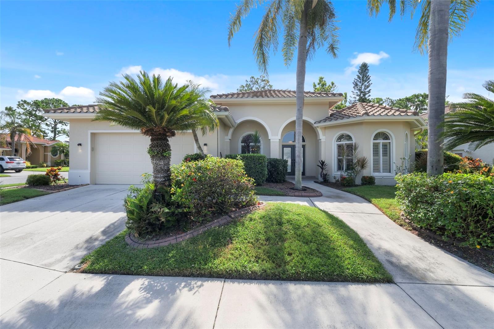 Price Reduction! Great Home in Palmer Ranch. Well-Maintained Pool Home with Recent Upgrades in Huntington Pointe. Set on a large corner lot in the sought-after Palmer Ranch community, this 3-bedroom, 2.5-bath + den/office home offers over 2,700 sq. ft. of comfortable living. While the interior maintains its original charm, the home boasts many recent upgrades including all new kitchen appliances (2023) — induction cooktop, wall oven, dishwasher, refrigerator, disposal — plus new faucets, upgraded door hardware, freshly painted bedrooms and office, comfort-height toilets, and a new washer and dryer. The bright kitchen with central island and breakfast nook overlooks the sparkling saltwater pool and screened lanai. Outdoors, the entire exterior of the home — including the pool cage with new screening — has been freshly painted. Additional updates include a refinished garage floor, new pool pump (2024), rebuilt well system (2025), and refreshed landscaping. Enjoy multiple living spaces, a cozy fireplace, and a primary suite with double walk-in closets and a spa-like bath. Roof (2019) and hot water heater (2021) add peace of mind. Furnishings are negotiable. Minutes to Legacy Trail, Siesta Key Beach, shopping, dining, and more — this home is ready for your personal touch.