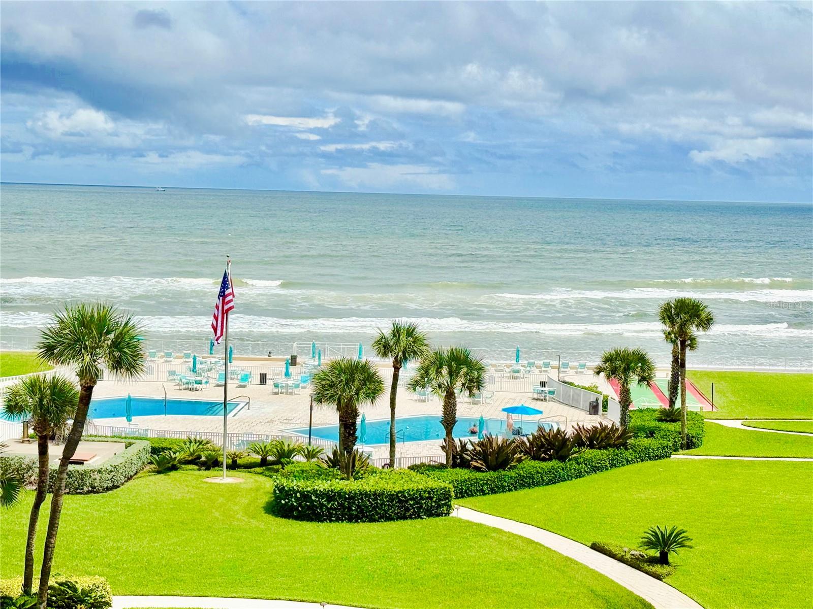 Fully furnished 1BR/2BA top-floor end unit in Errol By The Sea with stunning ocean views and direct, gated access to New Smyrna Beach’s no-drive beach. The primary with en-suite allows for privacy , while the second full bath provides extra flexibility for guests. Open floor plan, private balcony, in-unit laundry, and resort-style amenities including two community pools, tennis, pickleball, shuffleboard, clubhouse, and beach access. Conveniently located near shopping and dining. Move-in ready and available for lease.  Listing agent is the owner of the property and a licensed Realtor.