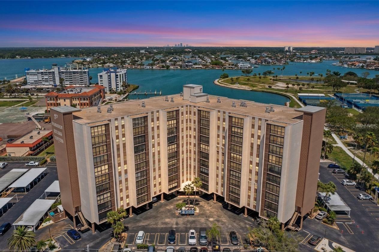 Welcome to Paradise Island Tower, where waterfront living meets exceptional value! This beautifully maintained 2-bedroom, 2-bath condominium offers stunning water views and an open-concept floor plan designed for relaxed coastal living.
Step inside to discover updated flooring, spacious living and dining areas, and abundant natural light that showcases the breathtaking waterfront scenery. The open layout creates a seamless flow, making it perfect for entertaining guests or simply enjoying the tranquil views from the comfort of home.
The well-appointed kitchen overlooks the main living area, allowing you to stay connected while preparing meals and enjoying the waterfront backdrop. Both bedrooms offer comfortable accommodations, while the primary suite provides a private retreat to unwind after a day on the water.
One of the standout features of Paradise Point is the availability of on-site boat slips, making it easy for friends and family to arrive by boat and enjoy the Florida lifestyle. Whether you're heading out for a day on the water or watching dolphins and sunsets from home, this community delivers the ultimate coastal experience.
Priced to sell quickly, this is an incredible opportunity to own a waterfront condo in highly desirable Treasure Island. Furnishings are negotiable, making this an ideal option for a primary residence, vacation getaway, or investment property.
Don't miss your chance to own your piece of paradise—schedule your private showing today!
