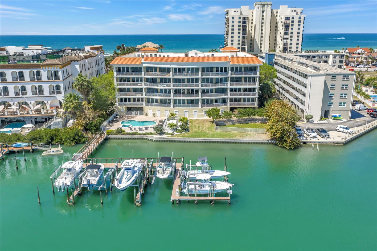 Price Reduced! Discover Belle Marguerite—where coastal charm meets comfort and convenience. This beautifully updated 3-bedroom, 3-bath end-unit condo at 3805 Gulf Blvd #205 features captivating views of the Intracoastal Waterway and sits just steps from the pristine Gulf beaches of St. Petersburg.
Flooded with natural light thanks to its corner positioning, this spacious residence features new flooring throughout, fresh interior paint, and thoughtfully updated finishes including a new primary bathroom, updated bathroom fixtures, window treatments and modern lighting. The kitchen is ideal for entertaining with a breakfast bar and generous dining space, while the open living area flows seamlessly to an oversized private patio overlooking the pool and sparkling waterway—perfect for enjoying sunsets, dolphins, and passing boats.

Additional highlights include a 2025 hot water heater, 2025 reverse osmosis system, window treatments, and the convenience of being partially furnished—ready for immediate enjoyment or rental opportunity. The unit also offers abundant storage with closets in every bedroom, an owner’s closet, a private storage unit, and a poolside cabana for beach gear and bikes.

Belle Marguerite is a gated community featuring covered parking, an elevator, and direct access to a dock for fishing or relaxing by the water. With a 30-day minimum rental policy and pet-friendly allowance (2 pets max), this property is ideal as a primary residence, vacation home, or investment.

Located just steps from the beach and to some of the area’s most popular dining and waterfront spots, this is your chance to own a slice of paradise on Gulf Blvd.

Schedule your private showing today!