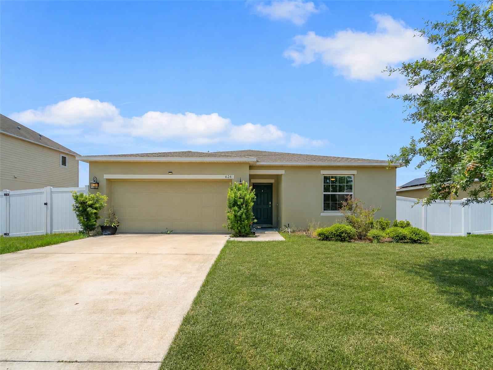 Beautifully home located in the sought-after community of Poinciana. This spacious 3-bedroom, 2-bath residence features an open and inviting layout designed for modern living. The stunning kitchen offers granite countertops, appliances, premium cabinetry with crown molding, a large island, and a dedicated dining area, ideal for everyday meals or entertaining guests. The primary suite provides a quiet retreat with a generous walk-in closet and private bath, a convenient utility room, back patio for outdoor enjoyment, landscaped front yard, and an attached 2-car garage. Residents will love the community’s impressive amenities, including sports fields, a basketball court, playground, dog park, soccer field, swimming pool, volleyball court, and more. Experience the comfort, value, and lifestyle the Amelia offers in beautiful Poinciana.