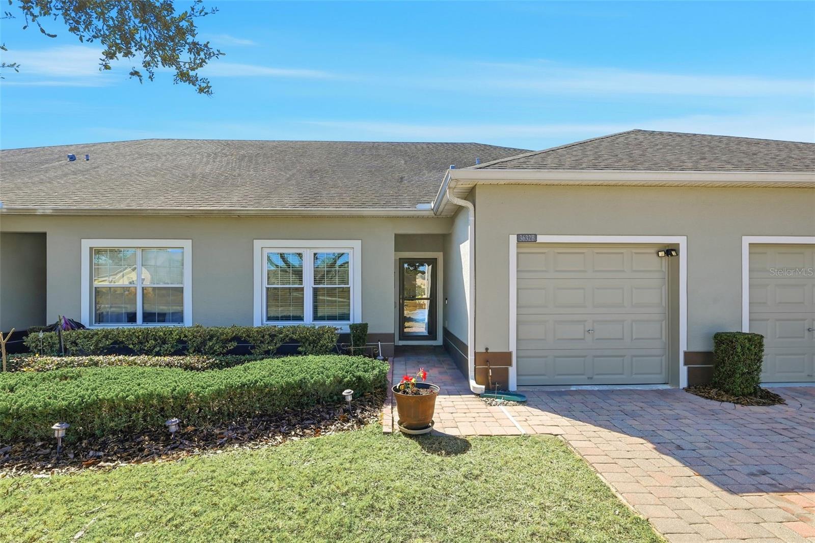 Located in the sought-after Heritage Hills 55 + community in Clermont, this well maintained one-owner St. Lucia model offers privacy, scenic preserve views, and an unbeatable location just moments from the clubhouse. With no rear neighbors and no future construction behind the home, you’ll enjoy peaceful outdoor living from the screened lanai and open backyard setting. This popular floor plan features 2 bedrooms, 2 bathrooms, plus a flexible bonus room ideal for a home office, den, or a separate dining room. Recent updates include energy- efficient high-impact windows and luxury vinyl plank flooring throughout the main living areas. The open concept layout is perfect for both everyday living and entertaining. The kitchen includes granite countertops, stainless steel appliances, a breakfast bar, and two pantries for ample storage. All appliances, including the washer and dryer, convey with the home. Additional highlights include updated ceiling fans, gutters, and a glass-and-screen front storm door. The Homeowners Association provides exceptional value with lawn maintenance, termite coverage, cable, Wi-Fi, exterior painting every five years, and a scheduled roof replacement for this specific villa scheduled for 2028. Residents of Heritage Hills enjoy resort-style amenities including a heated pool and spa, pickleball and tennis courts, fitness center, ballroom, walking trails, and an active social calendar. A one-year home warranty is included for added peace of mind. Schedule your private showing today and see why this beautiful villa would enhance your enjoyment living in one of Clermont’s premier 55+ communities.
