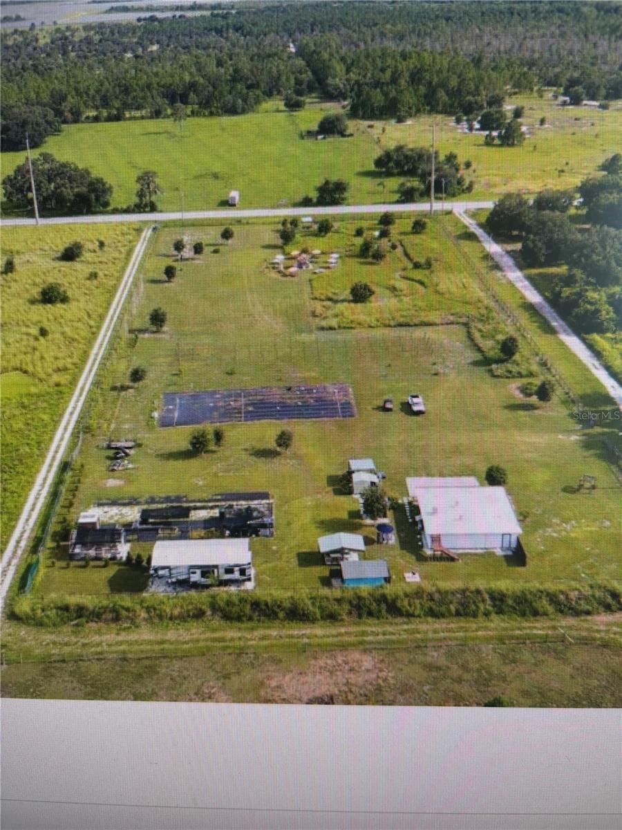 Rare opportunity to own a versatile piece of land on 5.49 acres. Offering the perfect opportunity to build your dream home. Enjoy Country Living, this prime fully fenced Property. It has everything , electric entrance gate, Well built 2021, Septic Tank 2021, Electric and Water all Connected. It has a building ,built in 2021 that is in perfect condition, with air conditioning,  living room, dining room, kitchen, bar, bathroom, office, and exercise room—the office and the exercise room could easily serve as two separate bedrooms., plenty of room. If you build a new property, this building will serve you well—whether for guests,  mother-in-law suite, or for whatever else you might need. Additional features include a 2018 Keystone Fuzion 427 2 bedroom 2 bath RV , very spacious. Zoned Agricultural NO HOA , NO CDD ,No Wetlands and Not in a Flood Zone(Not Flood Insurance Required). The lot is mostly cleared and with plenty of space for a barn, hobby farm, private retreat, outbuildings, livestock, Grow Crops, horses, etc. Also Allows to Park RV's ,Trailers, Boats ,etc. Conveniently located off of State Road 64 ,only 15 minutes to Publix, restaurants, just 25 minutes from, great shopping , Only 25 minutes to I-75. Don't miss your chance to own a slice of country paradise. Schedule your showing today
