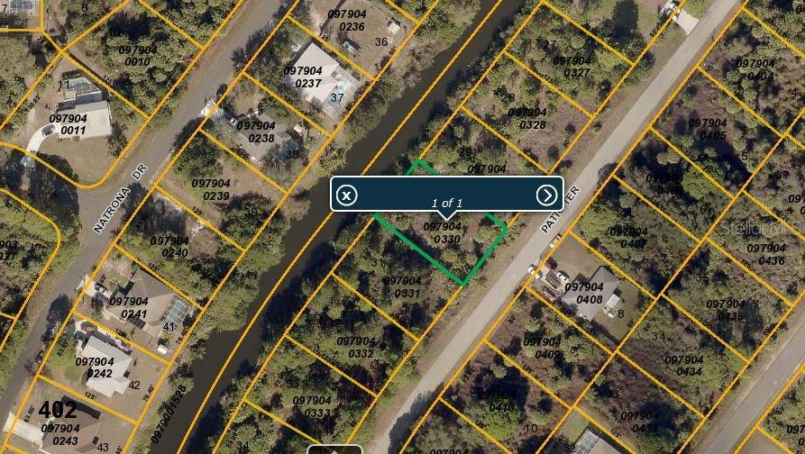 Vacant lot in the heart of North Port where you could build your new home.  Good size freshwater canal in the back coming off the Snover Waterway.  Come take a look at this neighborhood!