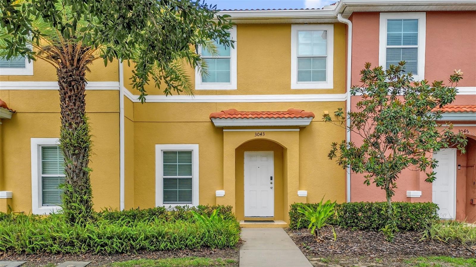Welcome to Encantada Resort. Situated just minutes from Disney, Universal Studios and Central Florida's attractions, this FULLY FURNISHED, updated 2-bedroom, 2.5-bath townhome offers proven income opportunity. 
The first floor features an updated kitchen, spacious living and dining area, a half bath and a laundry room. Sliding glass doors open to a screened lanai where a hot tub awaits after a long day out. 
Upstairs, both bedrooms are generously sized, each complete with it's own en-suite bathroom, walk in closet and TV. 
This home is being sold FULLY FURNISHED and boasts of a strong rental history, making it a great opportunity for short-term or long-term rentals for investors or anyone seeking a turnkey vacation home.