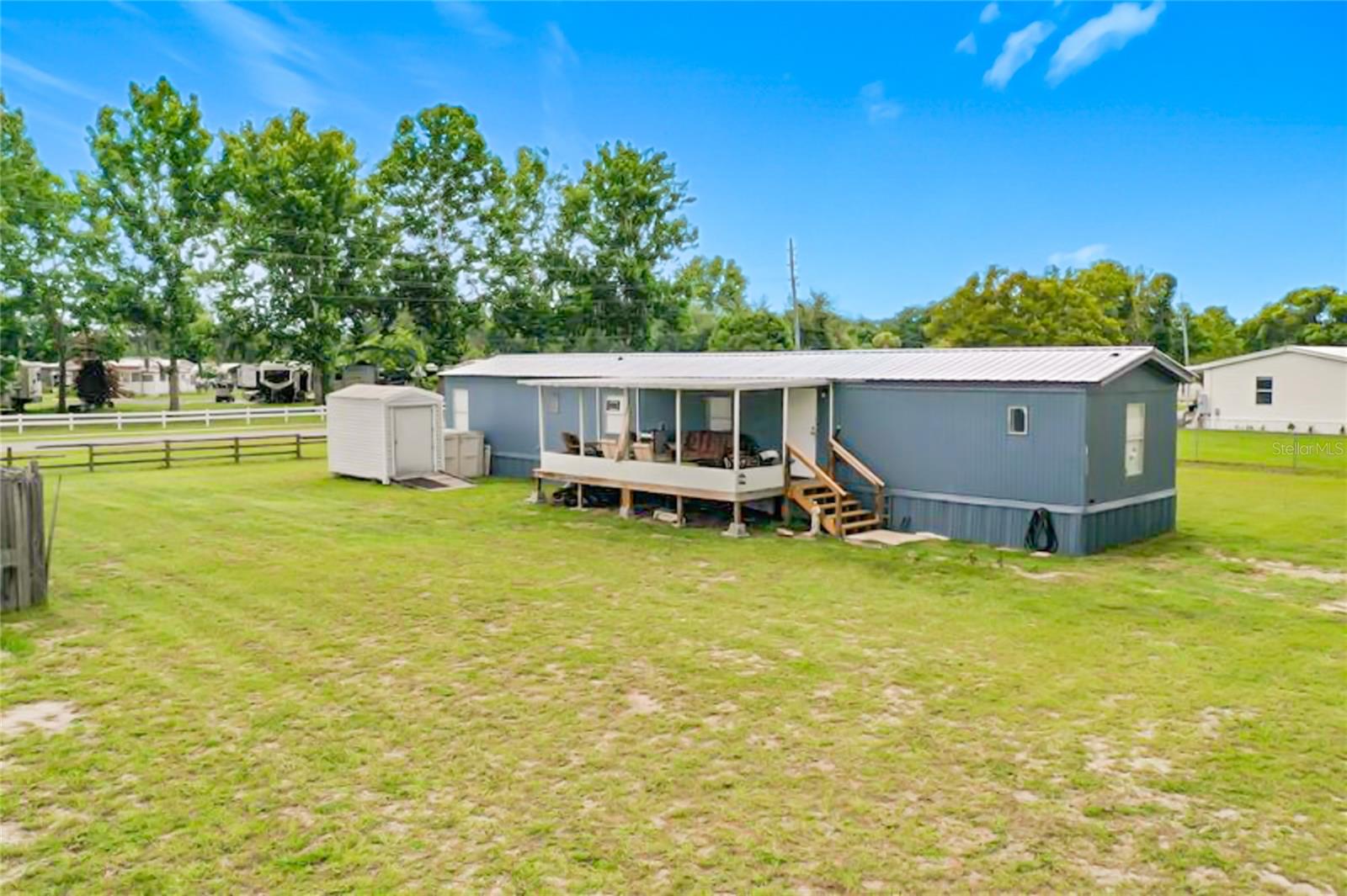 Welcome to this beautifully remodeled 2-bedroom, 2-bath single-wide manufactured home in the heart of Lake Panasoffkee! Situated on a spacious, fully fenced lot, this move-in-ready home offers comfort, functionality, and peace of mind with a durable metal roof.
Inside, you’ll find a tastefully updated interior featuring modern finishes, an inviting living area, and a functional split-bedroom floor plan that provides privacy for both owners and guests. The remodeled kitchen and bathrooms add a fresh, contemporary feel, making this home truly turnkey.
Step outside to enjoy the large fenced backyard—perfect for pets, entertaining, gardening, or simply relaxing. Whether you’re looking for a full-time residence, seasonal getaway, or investment opportunity, this property offers affordable Florida living in a quiet community.
Conveniently located near beautiful Lake Panasoffkee, public boat ramps, fishing, parks, restaurants, and I-75, you’ll enjoy easy access to both outdoor recreation and everyday conveniences.
Don’t miss your opportunity to own this charming, remodeled home in one of Central Florida’s favorite fishing and boating communities!