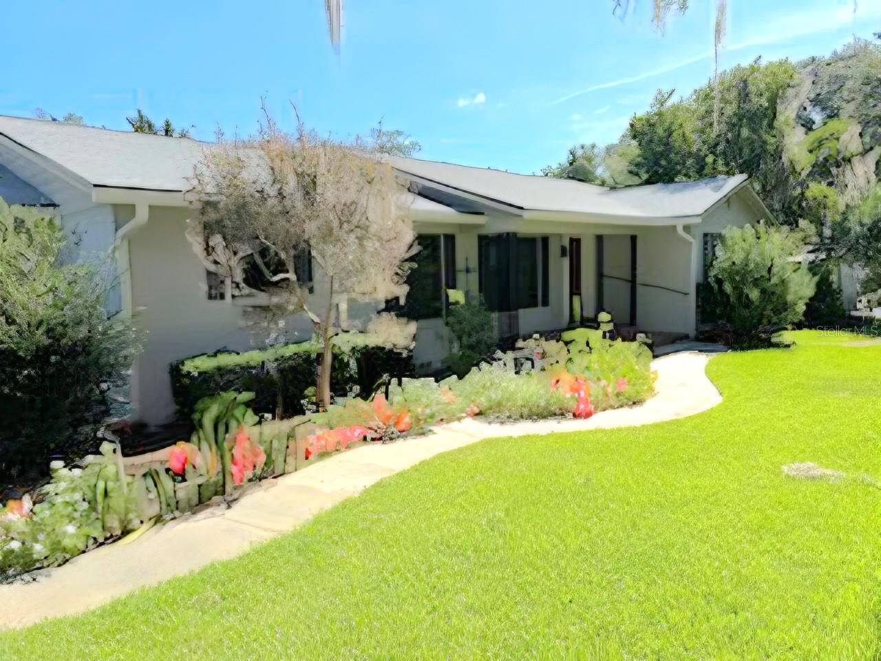 Located in an established neighborhood just minutes from Ocala's Historic District, this 3-bedroom, 2-bath, single-level home offers 2,236 square feet of living space on a desirable .43-acre corner lot. Built in 1967, it features beautiful hardwood floors, a bright sunroom with windows on three sides, generous closet space, and abundant natural light. Granite counters, stainless appliances, laundry in kitchen. 
Enjoy the private backyard with mature landscaping and a large in-ground pool, plus the peace of mind of a new roof (2025), dual HVAC systems and an attached 2-car garage.
This home is ready for cosmetic updates, offering a great opportunity to add your personal style in a sought-after location.