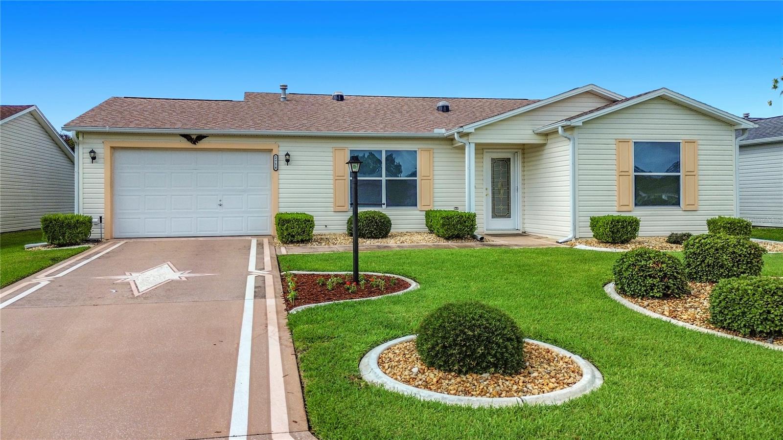 Welcome to this well maintained 2 bedroom 2 bathroom 1 owner Austin Model Home with Expanded Bonus Family Room & Enclosed Lanai.  FRESHLY PAINTED IN 2026, New Carpeting 2025, HVAC 2024, New Roof 2025, Dishwasher 2025, 3 Solar Tubes,  Open Concept Living with ADDITIONAL LARGE FAMILY/TV ROOM  that makes this home perfect for entertaining.  BOND IS PAID!         
In the Villages of Alhambra you are just a short Golf Cart ride to Entertainment, Stores, Restaurants, Pools, Golf and so much more.
Don't miss out on an opportunity to live in this friendly community where there is always something FUN going on!  Call for a private showing today!