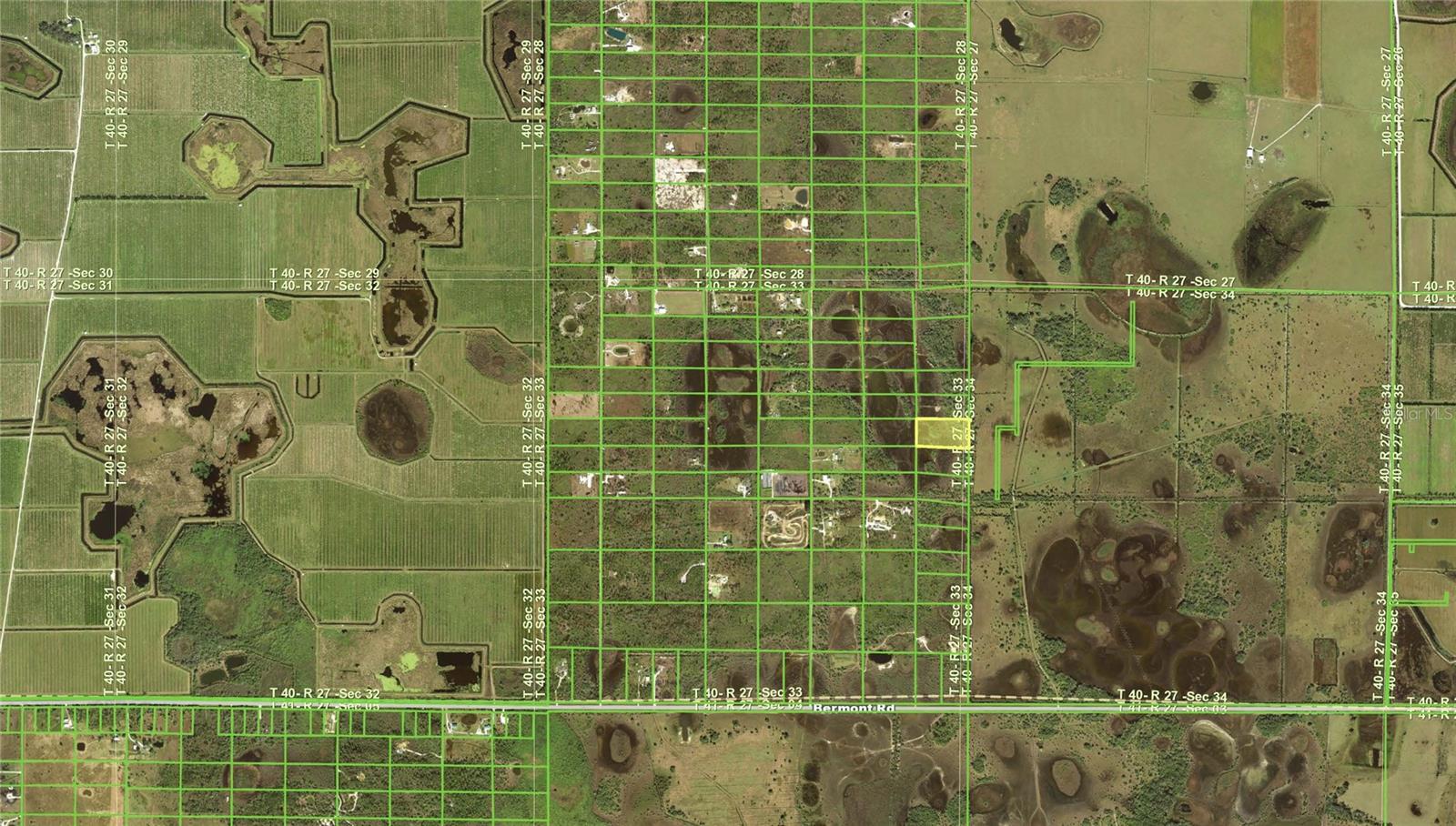 5 acres with dirt road access.  All the room you need for vehicles, trailers, and recreation.