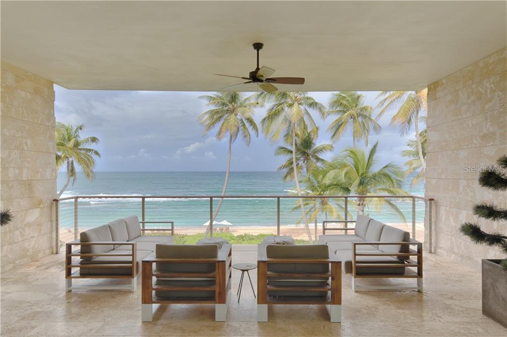 West Beach living within the Ritz Carlton Reserve at Dorado Beach represents an enviable tropical sand front lifestyle, amenity rich and vista inspired. Direct ocean frontage with over 3,900 sq. ft. of gracious interior and exterior living space.  An open contemporary design, the living room, dining, kitchen and master bedroom with bath boast inspiring blue ocean scenery as far as the eye can see.

The home incorporates a large terrace complete with dining and lounging in front of the beach and ocean; 9' high ceilings inside and out.  Corner living and dining room facing north and east, master suite with indoor and outdoor bathing, 2 additional bedrooms plus an oversized media room with separate lockout for those special guests. The Master bedroom suite looks towards the resort coast, creating an intimate atmosphere with the indoor soak tub and outdoor oasis shower.

Floor to ceiling galvanized sliding glass doors maximize the awesomeness of this next level backdrop. Built to capture the sound of the water and the beauty only Dorado Beach can provide, this Ritz Carlton Reserve residence highlights the sophistication of modern beachfront living. Sweeping waterfront landscapes paint each corner of this impeccably designed space, serving homage to this exclusive location.

Ritz Carlton Reserve branded residence owners benefit from the award-winning services and facilities of the Dorado Beach Reserve and may participate in the resort's highly successful rental program. 

The West Beach Residences have exclusive access to the Residences Concierge, as well as with membership, the Hotel facilities including multiple pools, dining venues, fitness, tennis and Acclaimed Spa Botanical.