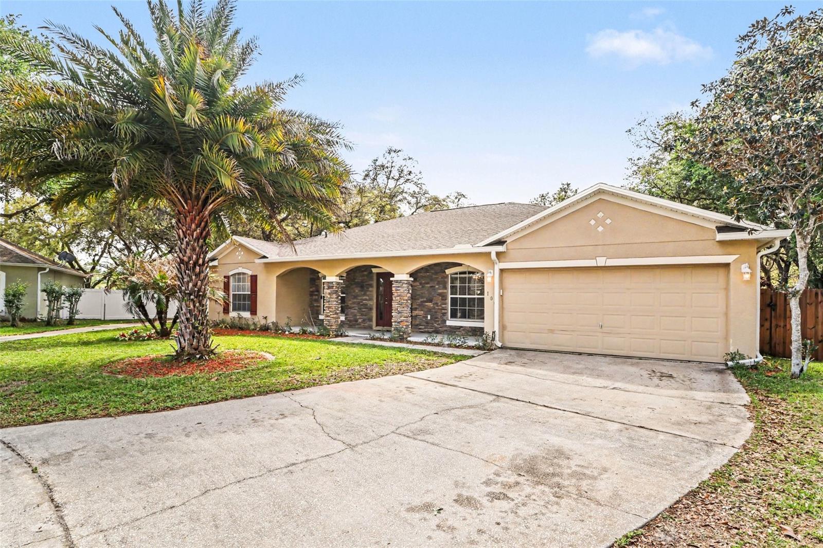 The desirable Trails community in Chuluota now has one of its best value homes available.  Over 2,500 hundred square feet of living space with four bedrooms, two bathrooms, a 400 square foot screened lanai sitting on nearly one third of an acre in the low $500,000s.  The attractive quality of engineered hardwood floors greet you inside the front door and covers the living, dining, and  family rooms.  Tile is found in the wet areas with brand new carpet throughout the bedrooms.  The spacious four bedroom split plan was covered with a brand new roof in March of 2026.  The new in 2022 attractive, stained, six foot high wood fence has a double gate egress to the beautiful park behind the home that is the perfect meeting place at the Snow Hill Trailhead found at the head of Flagler Trail South.  All this beauty left no room for rear neighbors.  Sitting at the end of a cul-de-sac, the attractive front elevation of 100 Festive Court is a welcome home sight when you turn onto this short, one block street.  Contact your agent and schedule your tour at your first opportunity!
